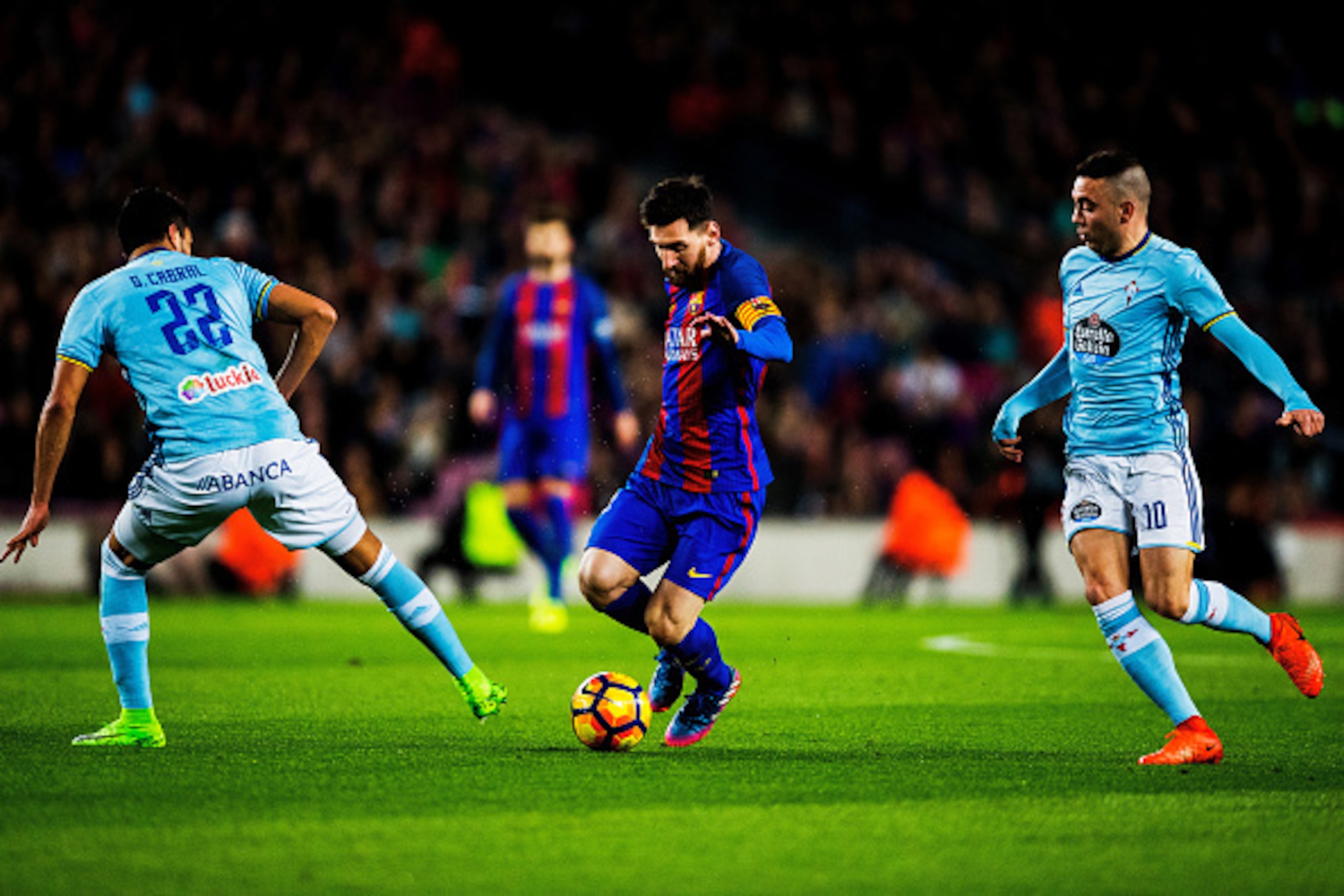 BARCELONA, SPAIN - MARCH 04: Lionel Messi of Barcelona attacks as Gustavo Cabral (L) and Iago Aspas of Celta defend during the La Liga match between FC Barcelona and RC Celta de Vigo at Camp Nou on March 04, 2017 in Barcelona, Spain. (Photo by Vladimir R BARCELONA, SPAIN - MARCH 04: Lionel Messi of Barcelona attacks as Gustavo Cabral (L) and Iago Aspas of Celta defend during the La Liga match between FC Barcelona and RC Celta de Vigo at Camp Nou on March 04, 2017 in Barcelona, Spain. (Photo by Vladimir R