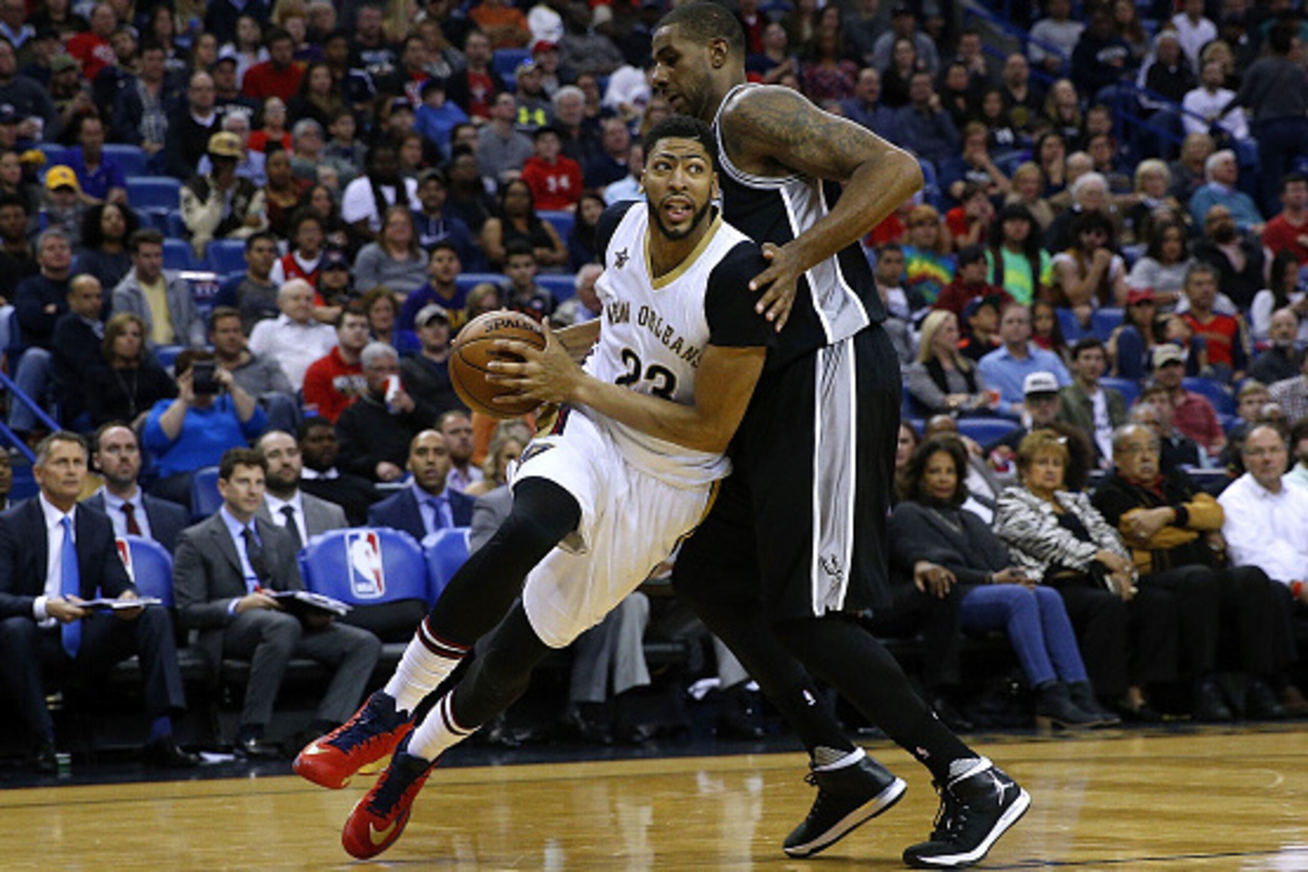 NEW ORLEANS, LA - MARCH 03:  Anthony Davis #23 of the New Orleans Pelicans drives against LaMarcus Aldridge #12 of the San Antonio Spurs during the second half of a game at the Smoothie King Center on March 3, 2017 in New Orleans, Louisiana. NOTE TO USER:
