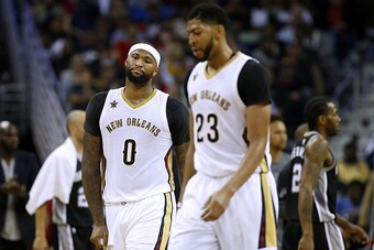 NEW ORLEANS, LA - MARCH 03: DeMarcus Cousins #0 of the New Orleans Pelicans and Anthony Davis #23 reacts during the second half of a game against the San Antonio Spurs at the Smoothie King Center on March 3, 2017 in New Orleans, Louisiana. NOTE TO USER: U