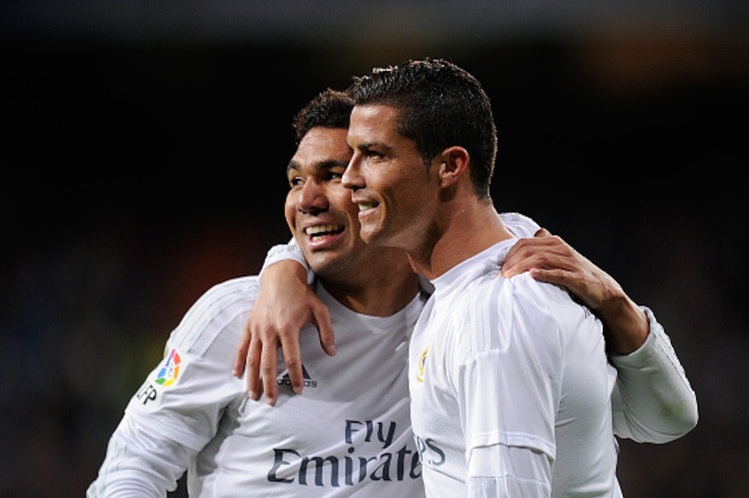 MADRID, SPAIN - MARCH 20:  Cristiano Ronaldo of Real Madrid celebrates with Henrique Casemiro after scoring Real's 2nd goal during the La Liga match between Real Madrid CF and Sevilla FC at Estadio Santiago Bernabeu on March 20, 2016 in Madrid, Spain.  (P