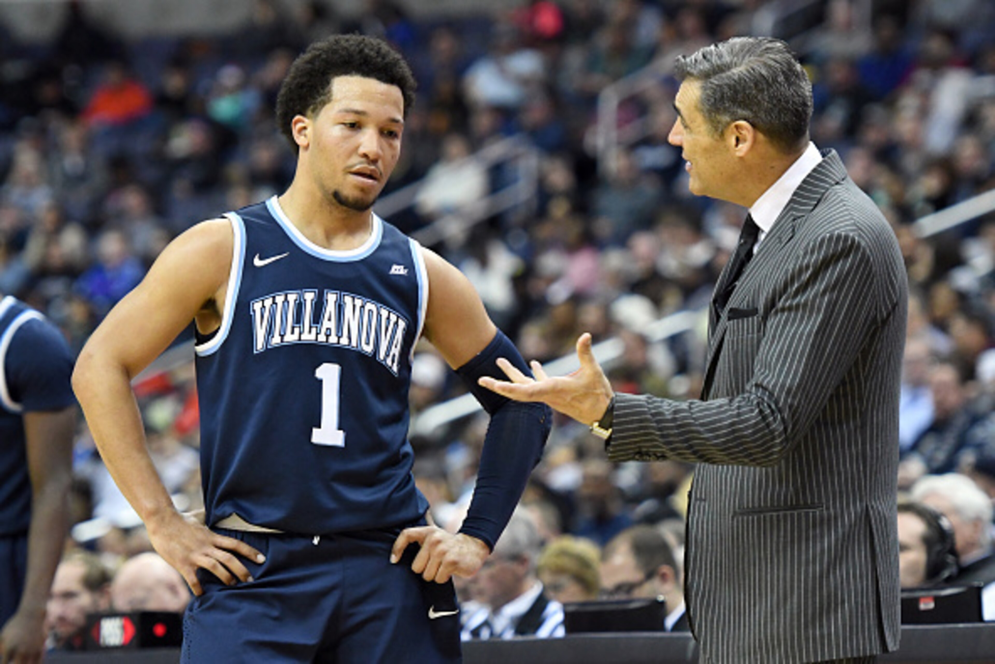 WASHINGTON, DC - MARCH 04: Jalen Brunson #1 of the Villanova Wildcats talks with head coach Jay Wright during a college basketball game against the Georgetown Hoyas at the Verizon Center on March 4, 2017 in Washington, DC. The Wildcats won 81-55. (Phot WASHINGTON, DC - MARCH 04: Jalen Brunson #1 of the Villanova Wildcats talks with head coach Jay Wright during a college basketball game against the Georgetown Hoyas at the Verizon Center on March 4, 2017 in Washington, DC. The Wildcats won 81-55. (Phot
