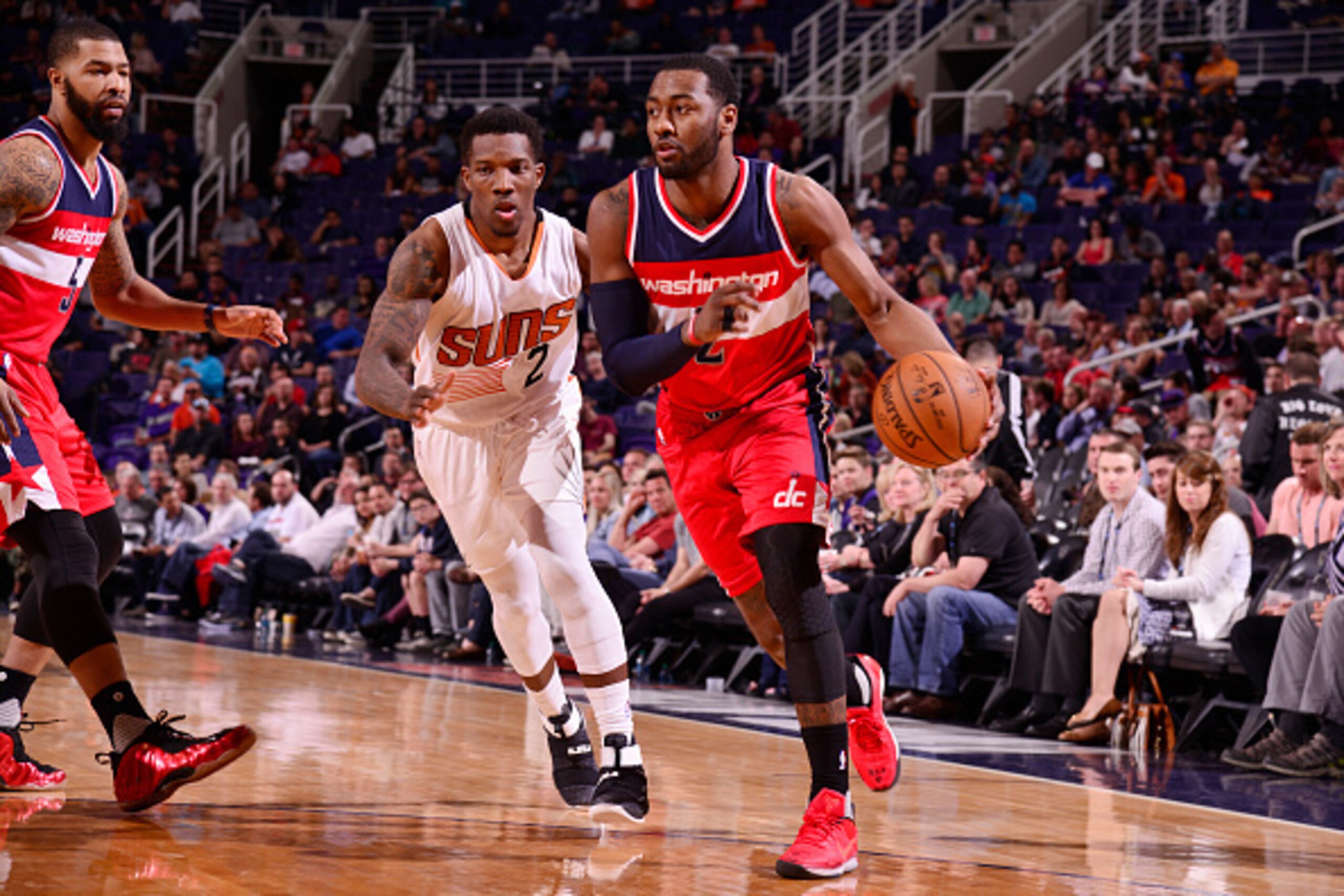 PHOENIX, AZ - MARCH 7: John Wall #2 of the Washington Wizards handles the ball against Eric Bledsoe #2 of the Phoenix Suns during the game on March 7, 2017 at Talking Stick Resort Arena in Phoenix, Arizona. NOTE TO USER: User expressly acknowledges and ag