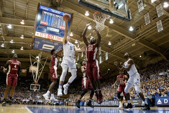 Kennard drives to the basket against the Florida State Seminoles on February 28, 2017, in Durham.