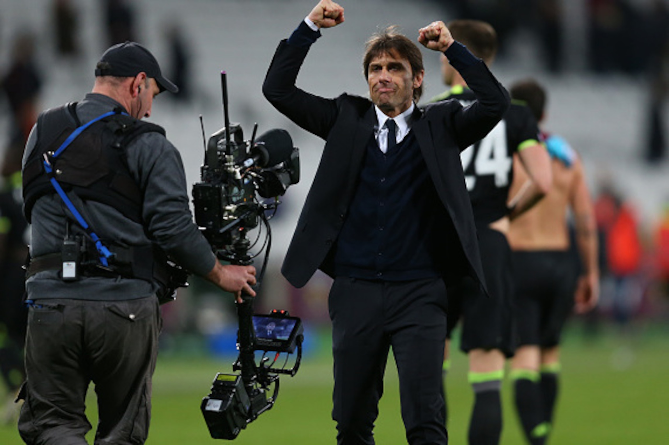 STRATFORD, ENGLAND - MARCH 06: The TV steadicam follows Antonio Conte manager of Chelsea as he celebrates after the Premier League match between West Ham United and Chelsea at London Stadium on March 6, 2017 in Stratford, England. (Photo by Catherine Ivil