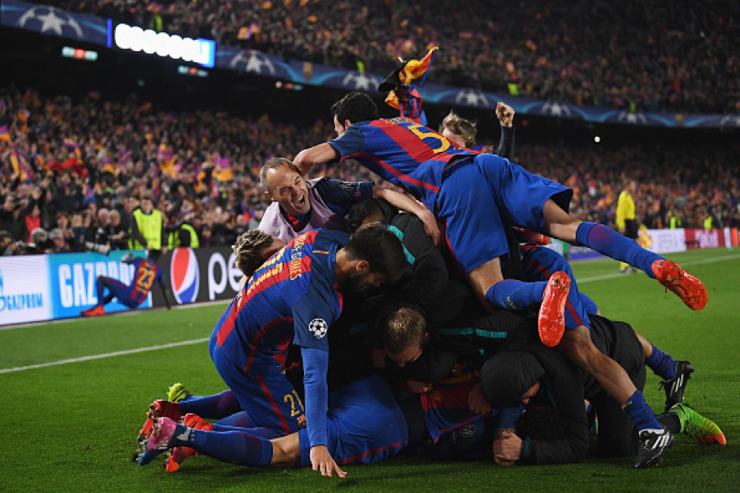 BARCELONA, SPAIN - MARCH 08:  Sergi Roberto of Barcelona (obscured) celebrates with team mates as he scores their sixth goal during the UEFA Champions League Round of 16 second leg match between FC Barcelona and Paris Saint-Germain at Camp Nou on March 8,
