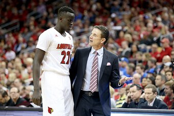 LOUISVILLE, KY - JANUARY 14:  Rick Pitino the head coach of the Louisville Cardinals gives instructions to his Deng Adel #22 during the game against the Duke Blue Devils at KFC YUM! Center on January 14, 2017 in Louisville, Kentucky.  (Photo by Andy Lyons