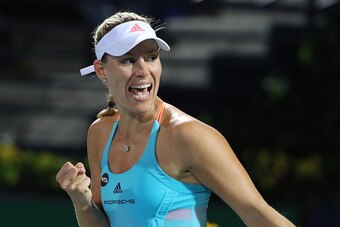 Angelique Kerber of Germany reacts after scoring against Elina Svitolina of Ukraine during their third semi final women's WTA Tennis Championship in Dubai on February 24, 2017. / AFP / KARIM SAHIB        (Photo credit should read KARIM SAHIB/AFP/Getty Ima