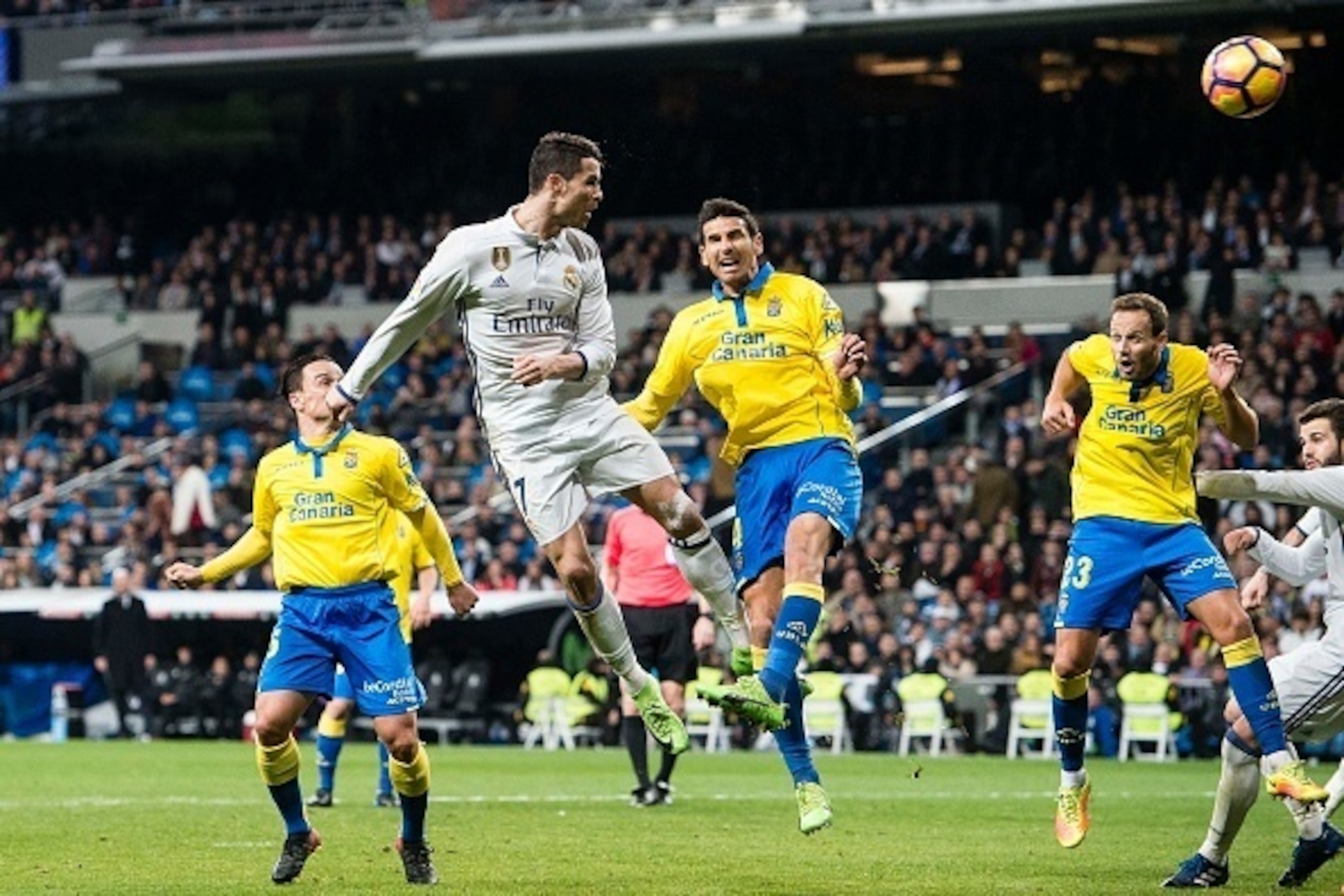 MADRID, SPAIN - MARCH 01: Cristiano Ronaldo of Real Madrid (L) heads the ball during their La Liga match between Real Madrid vs Las Palmas at the Santiago Bernabeu Stadium on 01 March 2017 in Madrid, Spain. (Photo by Power Sport Images/Getty Images)
