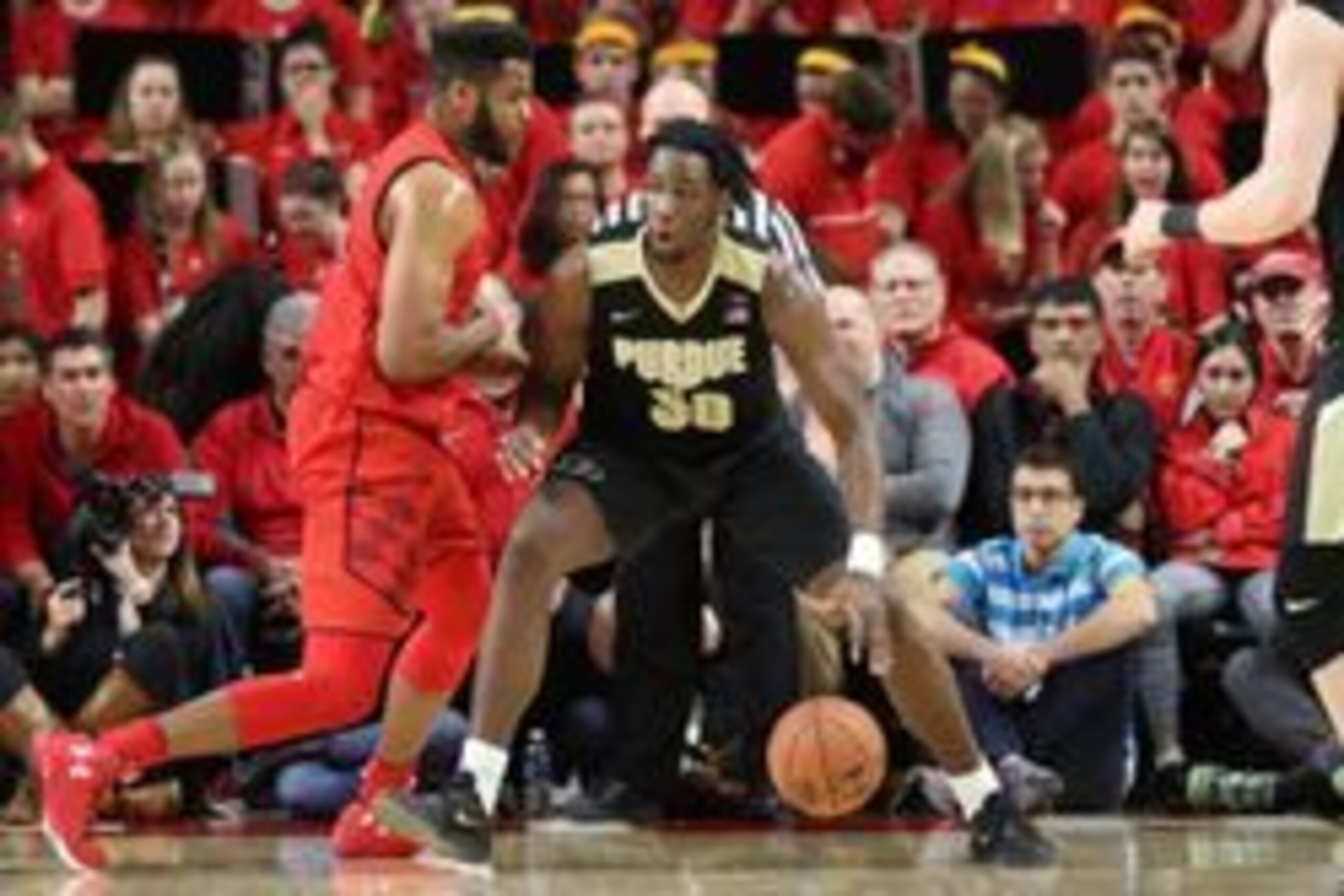 Feb 4, 2017; College Park, MD, USA; Purdue Boilermakers forward Caleb Swanigan (50) defended by Maryland Terrapins center Damonte Dodd (35) at Xfinity Center. Mandatory Credit: Mitch Stringer-USA TODAY Sports