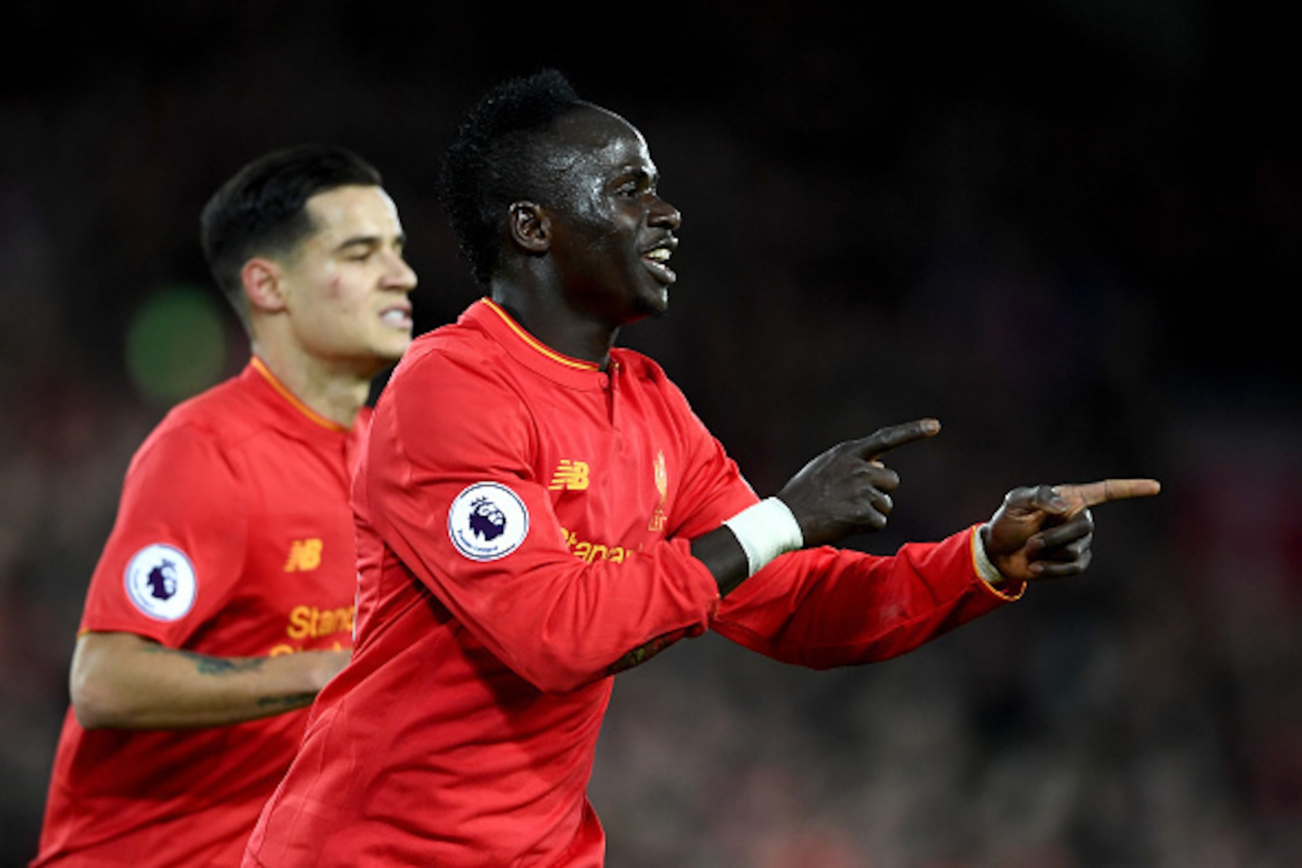 LIVERPOOL, ENGLAND - MARCH 04:  Sadio Mane of Liverpool celebrates scoring his sides second goal during the Premier League match between Liverpool and Arsenal at Anfield on March 4, 2017 in Liverpool, England.  (Photo by Laurence Griffiths/Getty Images)
