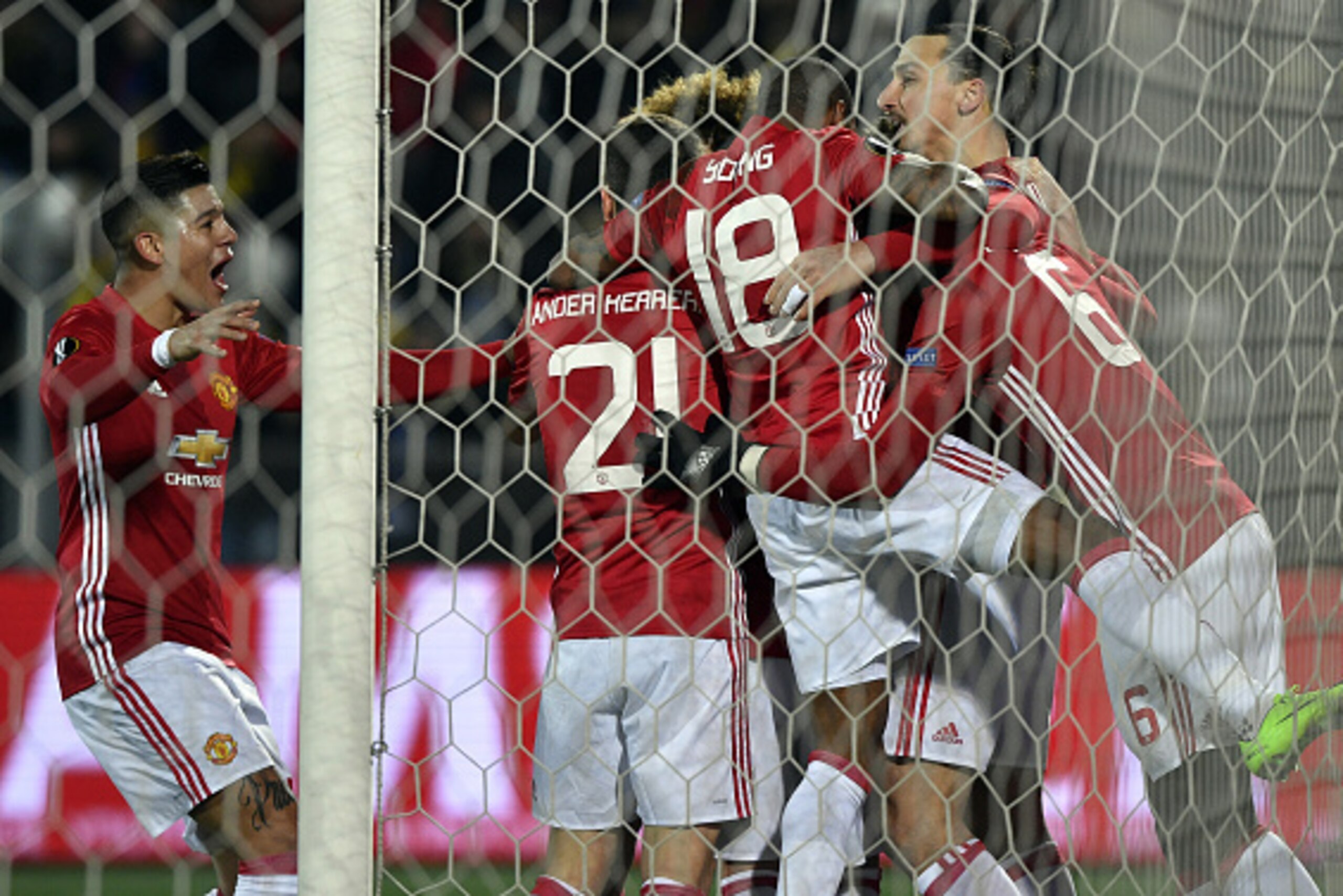 Manchester United's Swedish forward Zlatan Ibrahimovic (back R) celebrates with teammates after scoring a goal during the UEFA Europa League round of 16 football match between Rostov and Manchester United at Olimp-2 Arena in Rostov-on-Don on March 9, 2017