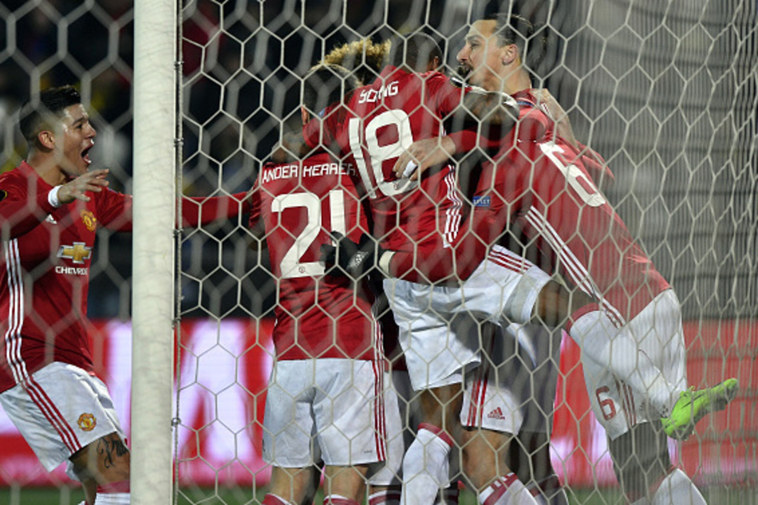 Manchester United's Swedish forward Zlatan Ibrahimovic (back R) celebrates with teammates after scoring a goal during the UEFA Europa League round of 16 football match between Rostov and Manchester United at Olimp-2 Arena in Rostov-on-Don on March 9, 2017