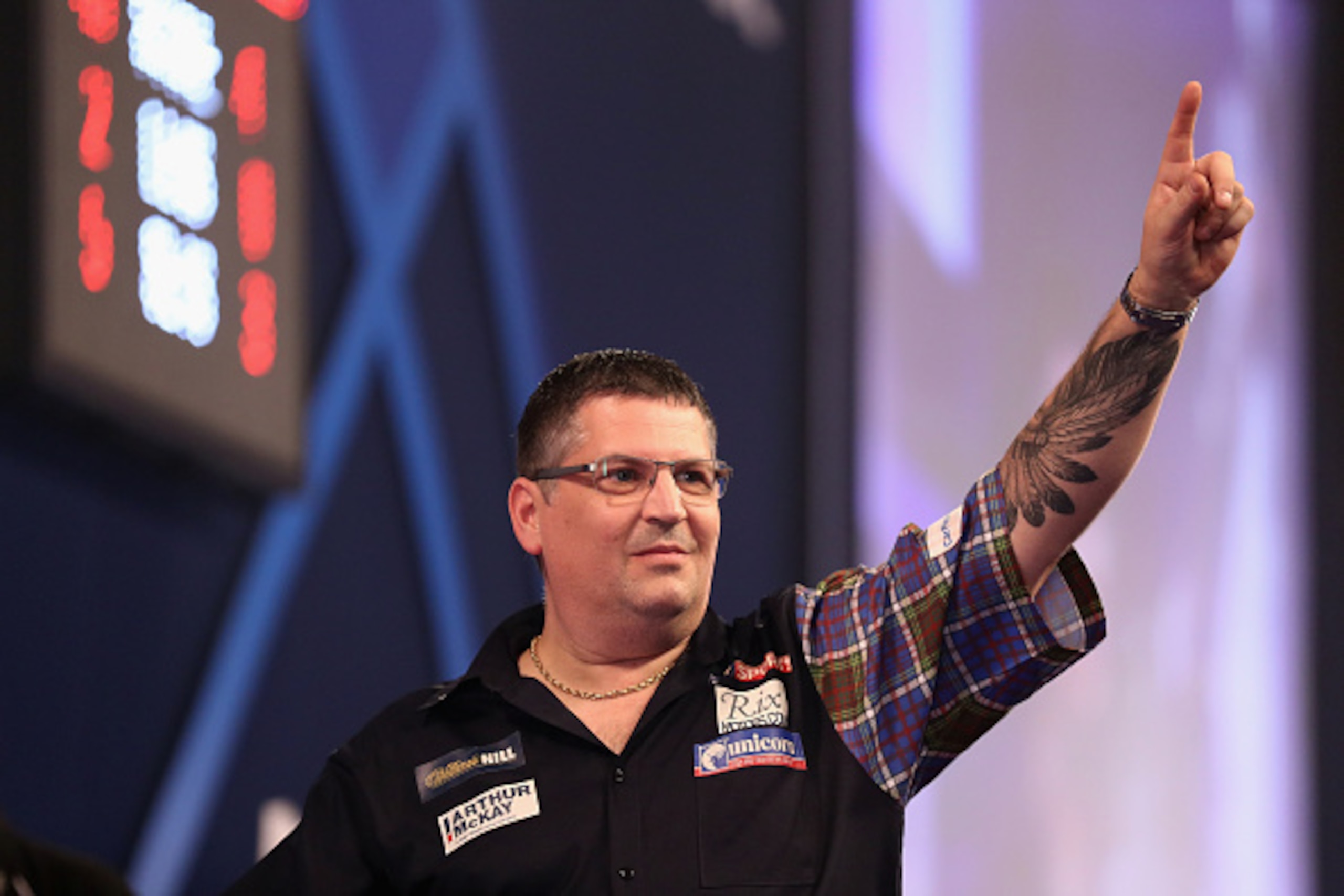 LONDON, ENGLAND - JANUARY 01:  Gary Anderson of Great Britain celebrates beating Peter Wright of Great Britain in their semi-final match on day fourteen of the 2017 William Hill PDC World Darts Championships at Alexandra Palace on January 1, 2017 in Londo