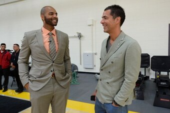 EL SEGUNDO, CA - JULY 25:  Carlos Boozer of the Los Angeles Lakers and Rob Pelinka after a press conference at the Toyota Sports Center on July 25, 2014 in El Segundo, California. NOTE TO USER: User expressly acknowledges and agrees that, by downloading a