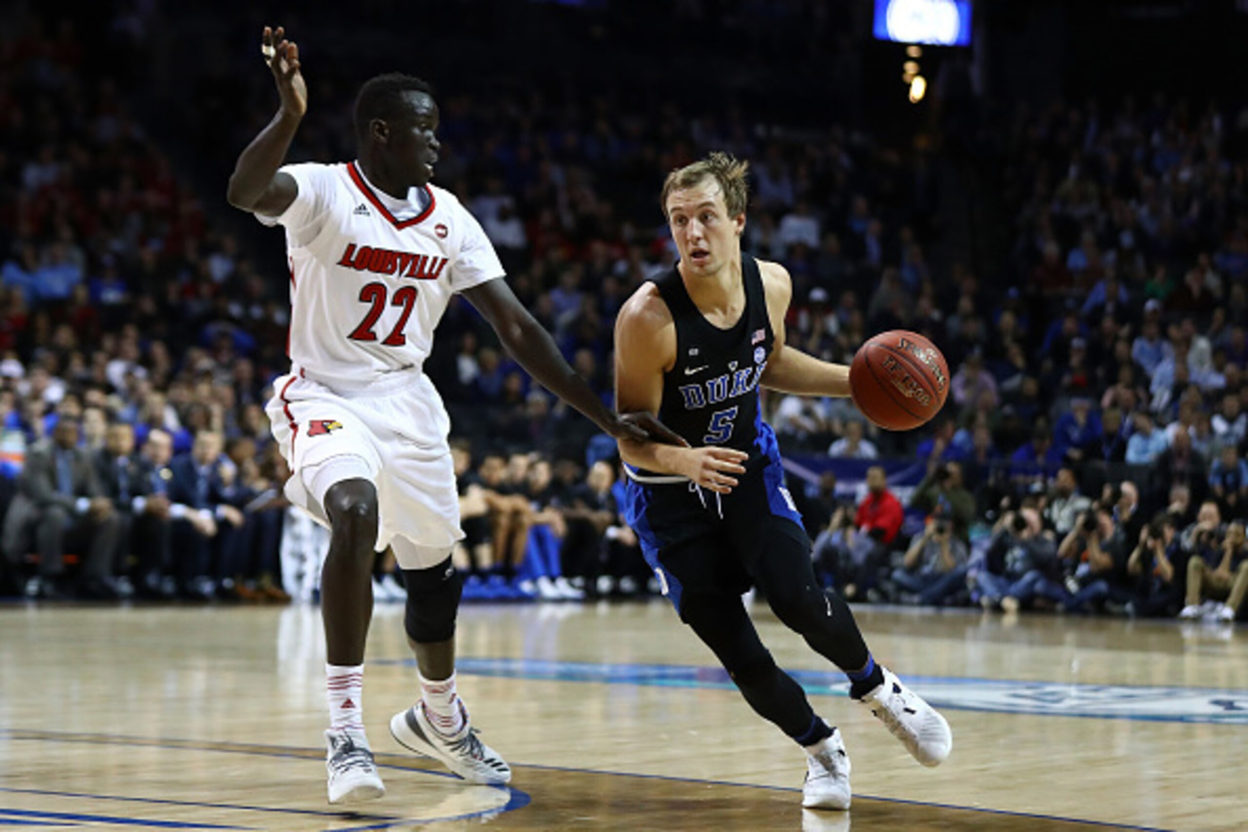 NEW YORK, NY - MARCH 09:  Luke Kennard #5 of the Duke Blue Devils drives against Deng Adel #22 of the Louisville Cardinals  during the Quarterfinals of the ACC Basketball Tournament  at the Barclays Center on March 9, 2017 in New York City.  (Photo by Al 