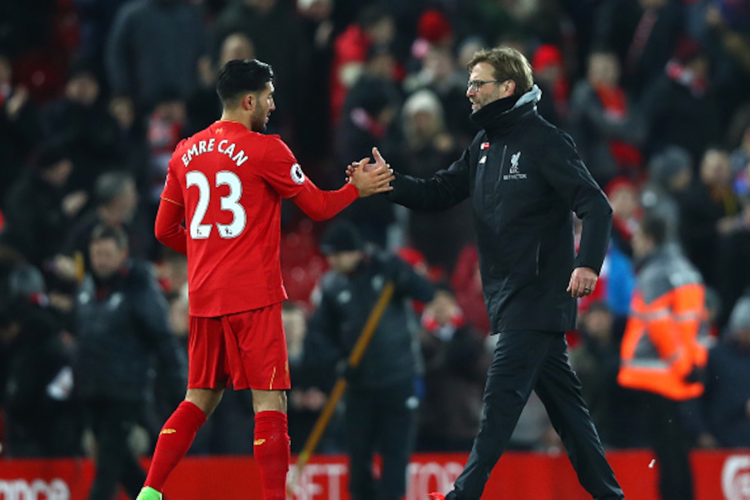 LIVERPOOL, ENGLAND - FEBRUARY 11: Jurgen Klopp, Manager of Liverpool celebrates with Emre Can after the Premier League match between Liverpool and Tottenham Hotspur at Anfield on February 11, 2017 in Liverpool, England.  (Photo by Clive Brunskill/Getty Im