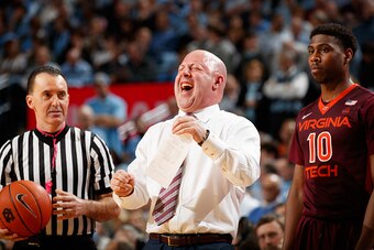 CHAPEL HILL, NC - JANUARY 26: Head coach Buzz Williams of the Virginia Tech Hokies laughs while talking with game official Roger Ayers during a game against the North Carolina Tar Heels on January 26, 2017 at the Dean Smith Center in Chapel Hill, North Ca