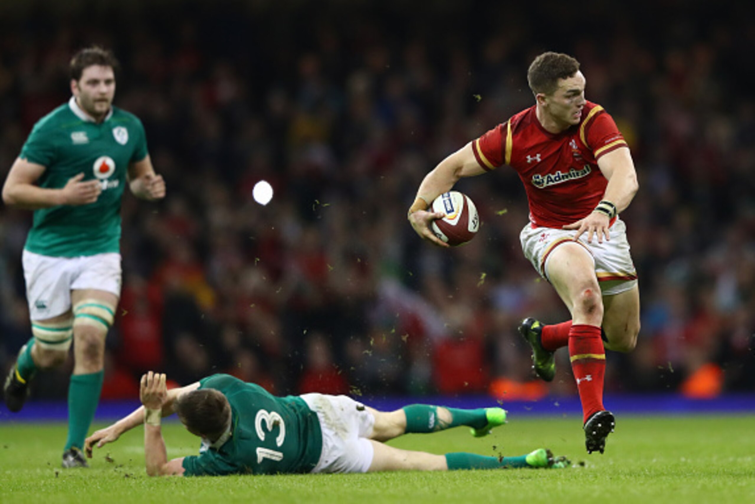 CARDIFF, WALES - MARCH 10:  George North of Wales evades a tackle by Garry Ringrose of Ireland during the Six Nations match between Wales and Ireland at the Principality Stadium on March 10, 2017 in Cardiff, Wales.  (Photo by Michael Steele/Getty Images)