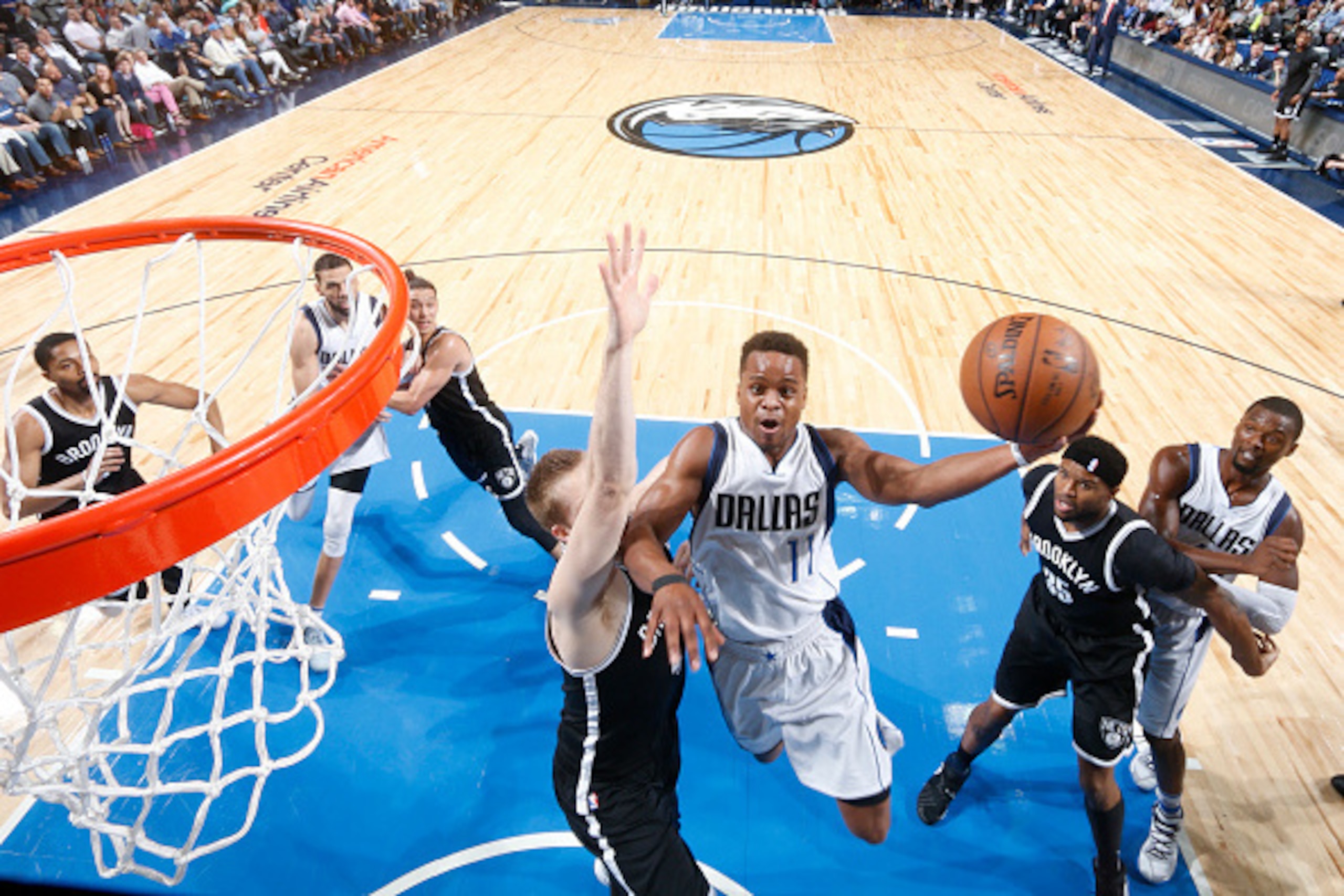 DALLAS, TX - MARCH 10:  Yogi Ferrell #11 of the Dallas Mavericks goes up for a shot during a game against the Brooklyn Nets on March 10, 2017 at American Airlines Center in Dallas, Texas. NOTE TO USER: User expressly acknowledges and agrees that, by downl