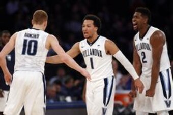 Mar 9, 2017; New York, NY, USA; Villanova Wildcats forward Kris Jenkins (2) and guard Jalen Brunson (1) celebrate after Villanova Wildcats guard Donte DiVincenzo (10) scored against St. John's Red Storm during second half of Big East Conference Tournament