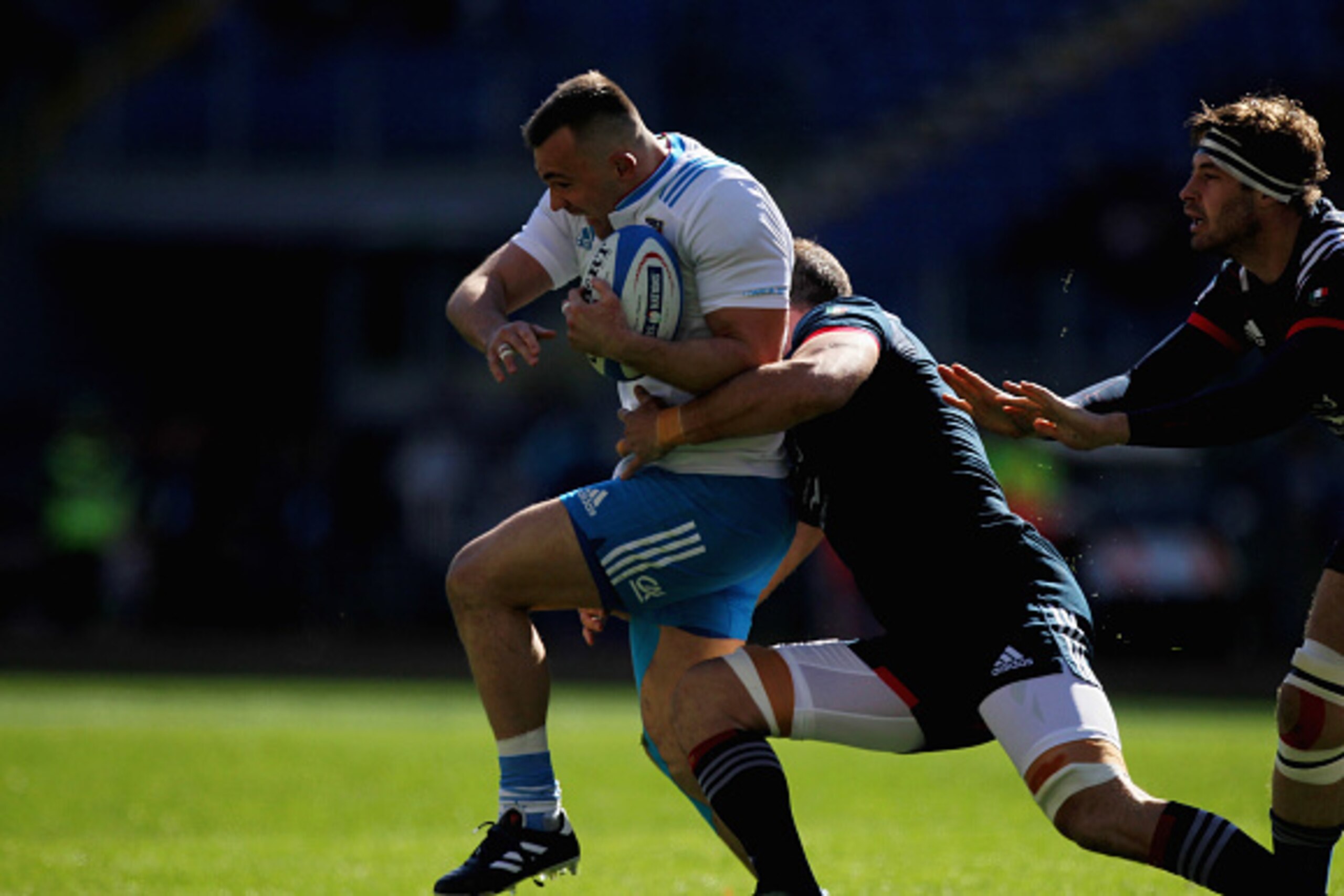 ROME, ITALY - MARCH 11:  Simone Favaro of Italy is tackled by France player during the RBS Six Nations match between Italy and France at Stadio Olimpico on March 11, 2017 in Rome, Italy.  (Photo by Paolo Bruno/Getty Images)