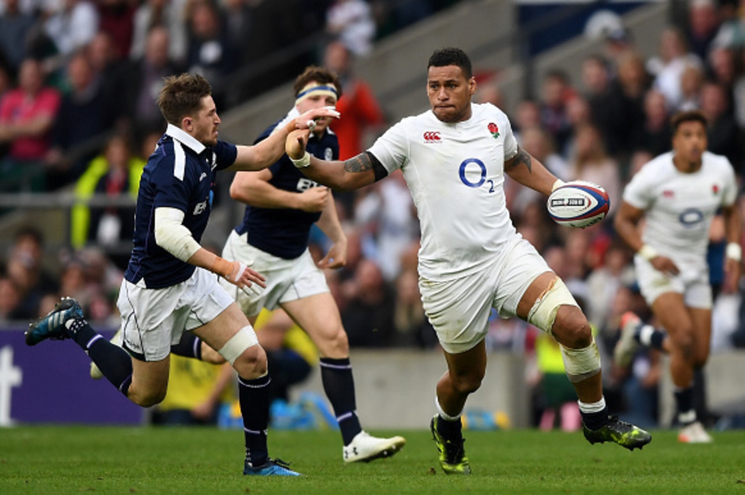 LONDON, ENGLAND - MARCH 11: Nathan Hughes of England (R) attempts to get past the Scottish defence during the RBS Six Nations match between England and Scotland at Twickenham Stadium on March 11, 2017 in London, England. (Photo by Shaun Botterill/Getty I LONDON, ENGLAND - MARCH 11: Nathan Hughes of England (R) attempts to get past the Scottish defence during the RBS Six Nations match between England and Scotland at Twickenham Stadium on March 11, 2017 in London, England. (Photo by Shaun Botterill/Getty I