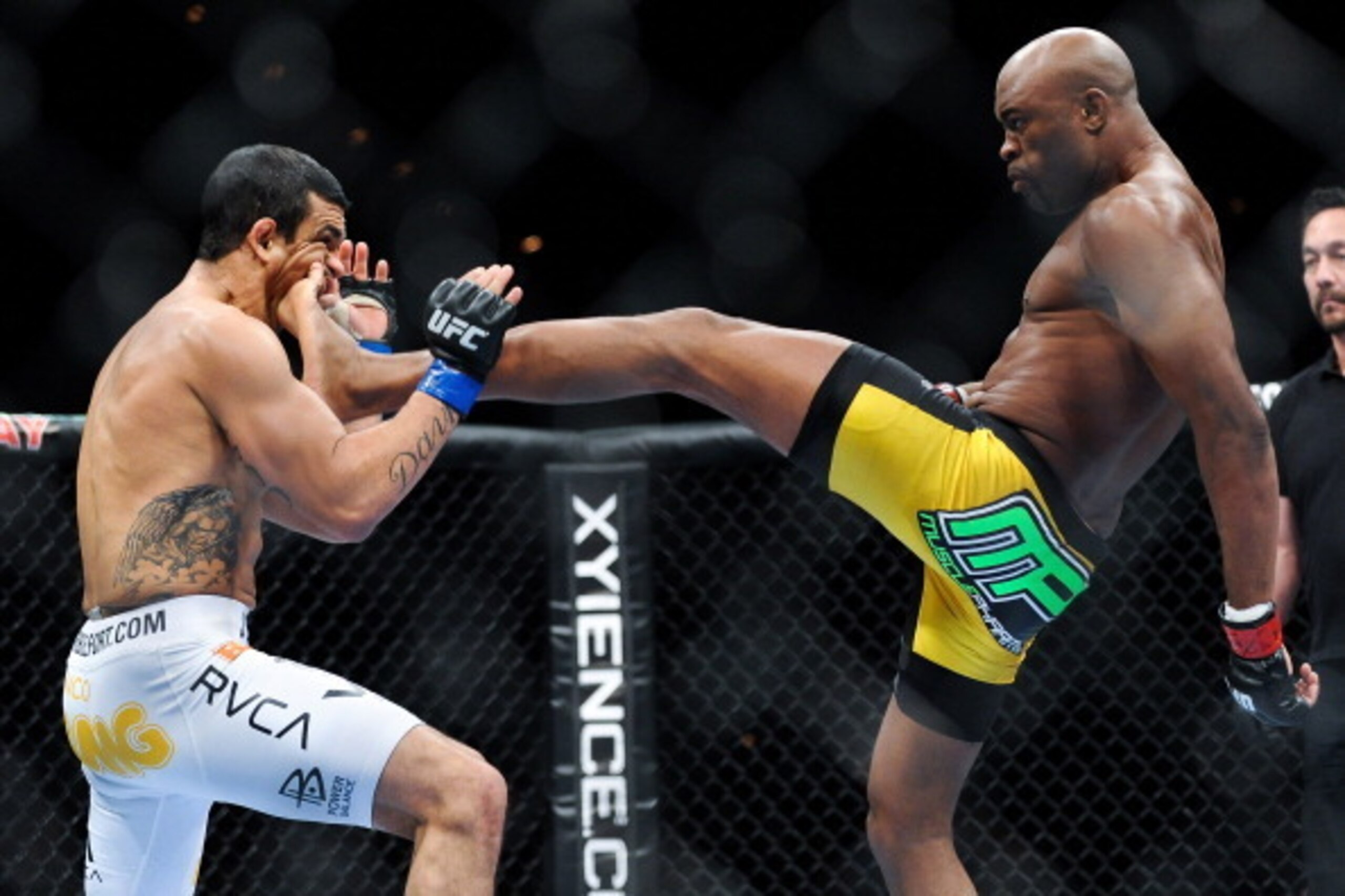 LAS VEGAS, NV - FEBRUARY 05: (R-L) Anderson Silva lands a kick to the jaw of Vitor Belfort that knocked out the Brazilian challenger at UFC 126 at the Mandalay Bay Resort and Casino on February 5, 2011 in Las Vegas, Nevada. (Photo by James Law/Zuffa LLC/Z