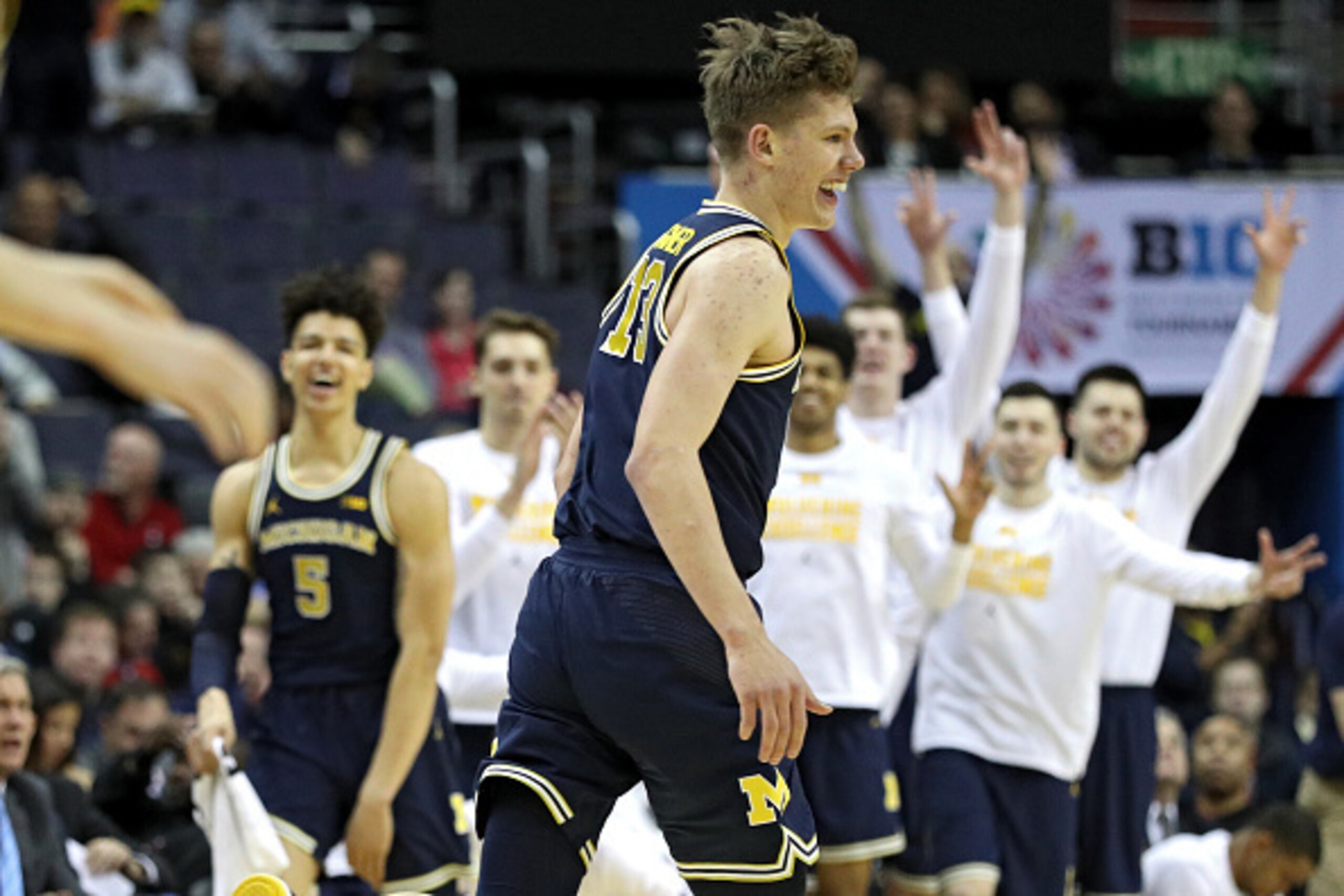 WASHINGTON, DC - MARCH 11: Moritz Wagner #13 of the Michigan Wolverines reacts after a basket against the Minnesota Golden Gophers during the first half in the semifinals of the Big Ten Basketball Tournament at Verizon Center on March 11, 2017 in Washingt