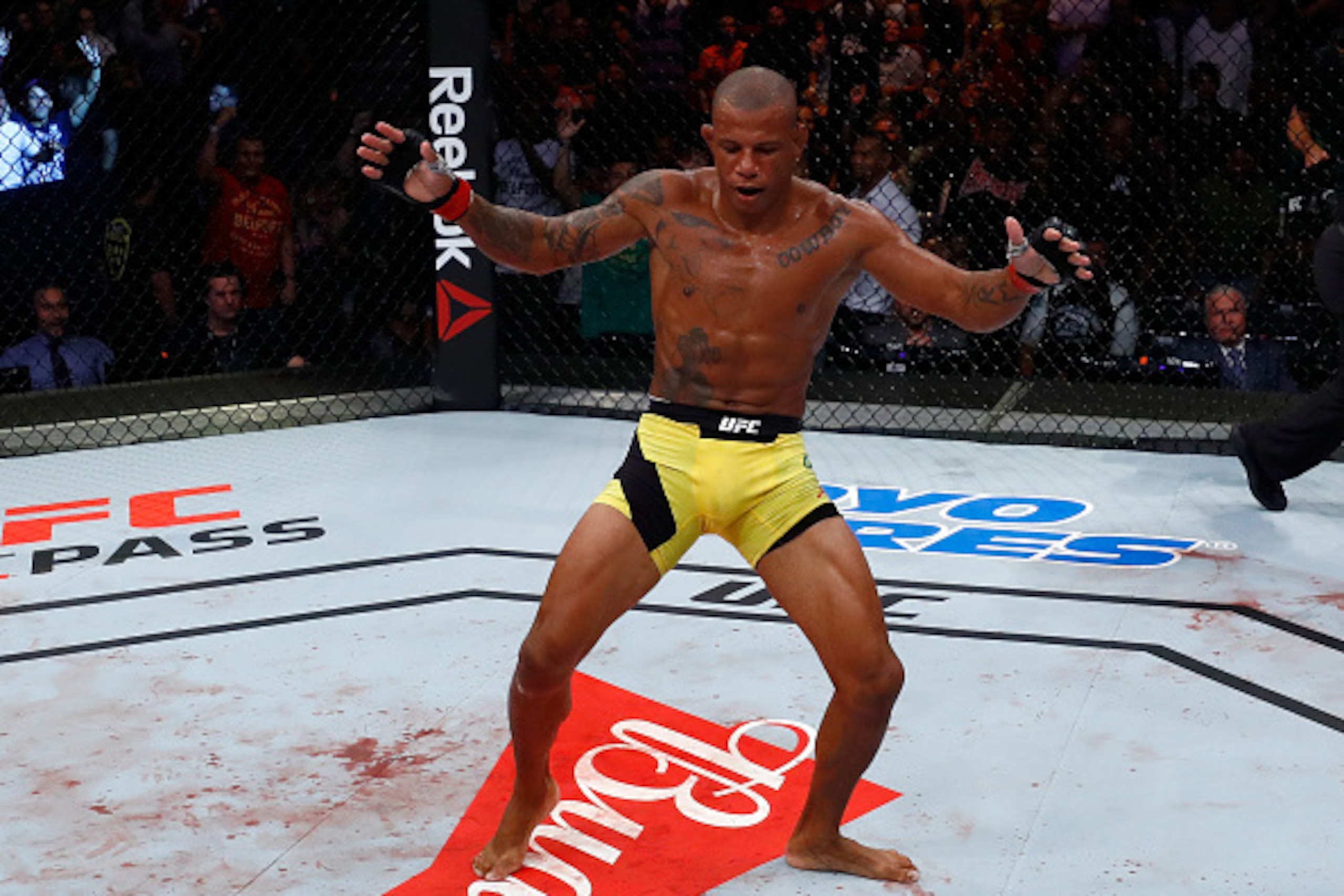 FORTALEZA, BRAZIL - MARCH 11: Alex Oliveira of Brazil celebrates after his submission victory over Tim Means in their welterweight bout during the UFC Fight Night event at CFO - Centro de FormaÂco Olimpica on March 11, 2017 in Fortaleza, Brazil. (Photo b FORTALEZA, BRAZIL - MARCH 11: Alex Oliveira of Brazil celebrates after his submission victory over Tim Means in their welterweight bout during the UFC Fight Night event at CFO - Centro de FormaÂco Olimpica on March 11, 2017 in Fortaleza, Brazil. (Photo b