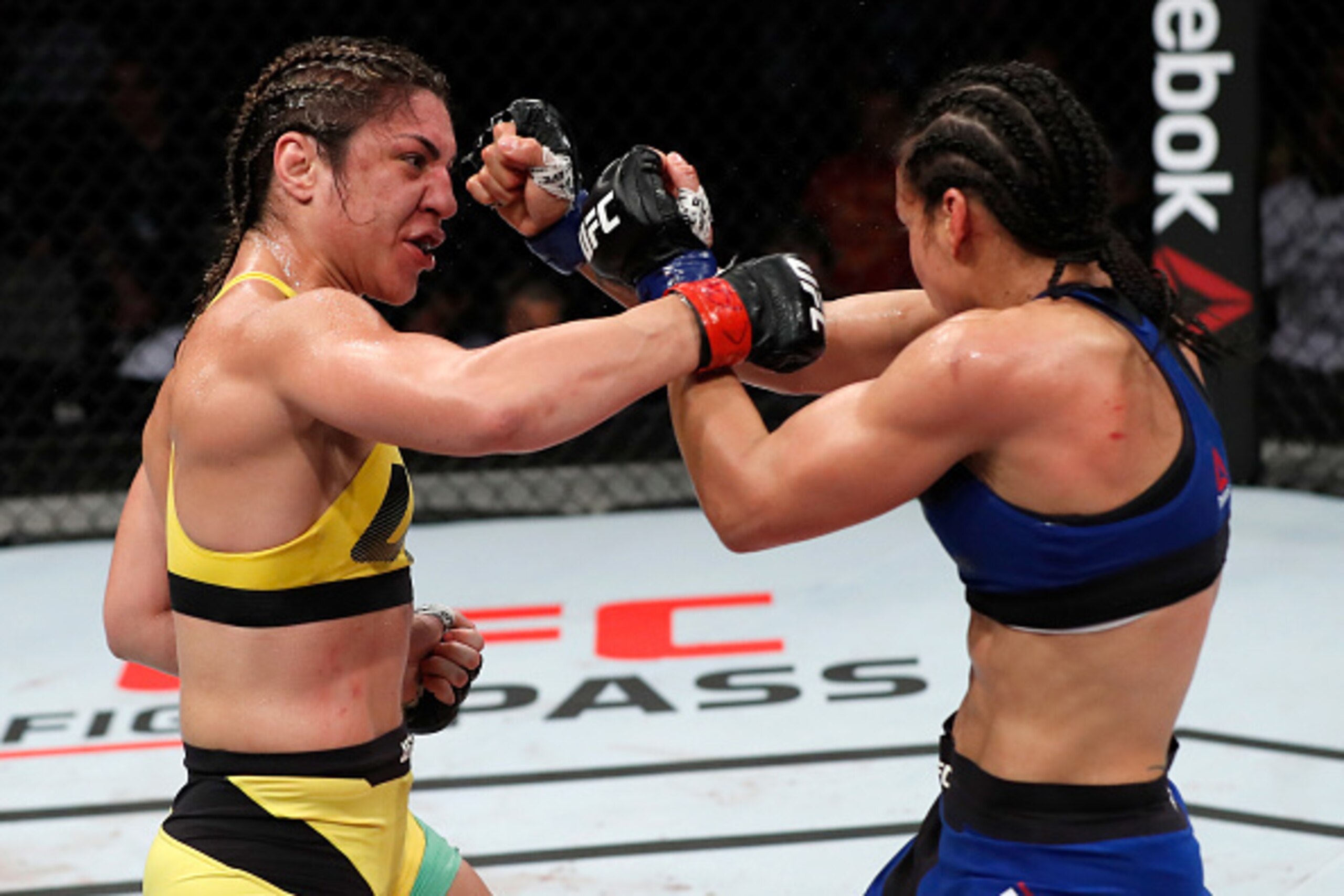 FORTALEZA, BRAZIL - MARCH 11: (L-R) Bethe Correia of Brazil punches Marion Reneau in their women's bantamweight bout during the UFC Fight Night event at CFO - Centro de FormaÂco Olimpica on March 11, 2017 in Fortaleza, Brazil. (Photo by Buda Mendes/Zuffa FORTALEZA, BRAZIL - MARCH 11: (L-R) Bethe Correia of Brazil punches Marion Reneau in their women's bantamweight bout during the UFC Fight Night event at CFO - Centro de FormaÂco Olimpica on March 11, 2017 in Fortaleza, Brazil. (Photo by Buda Mendes/Zuffa