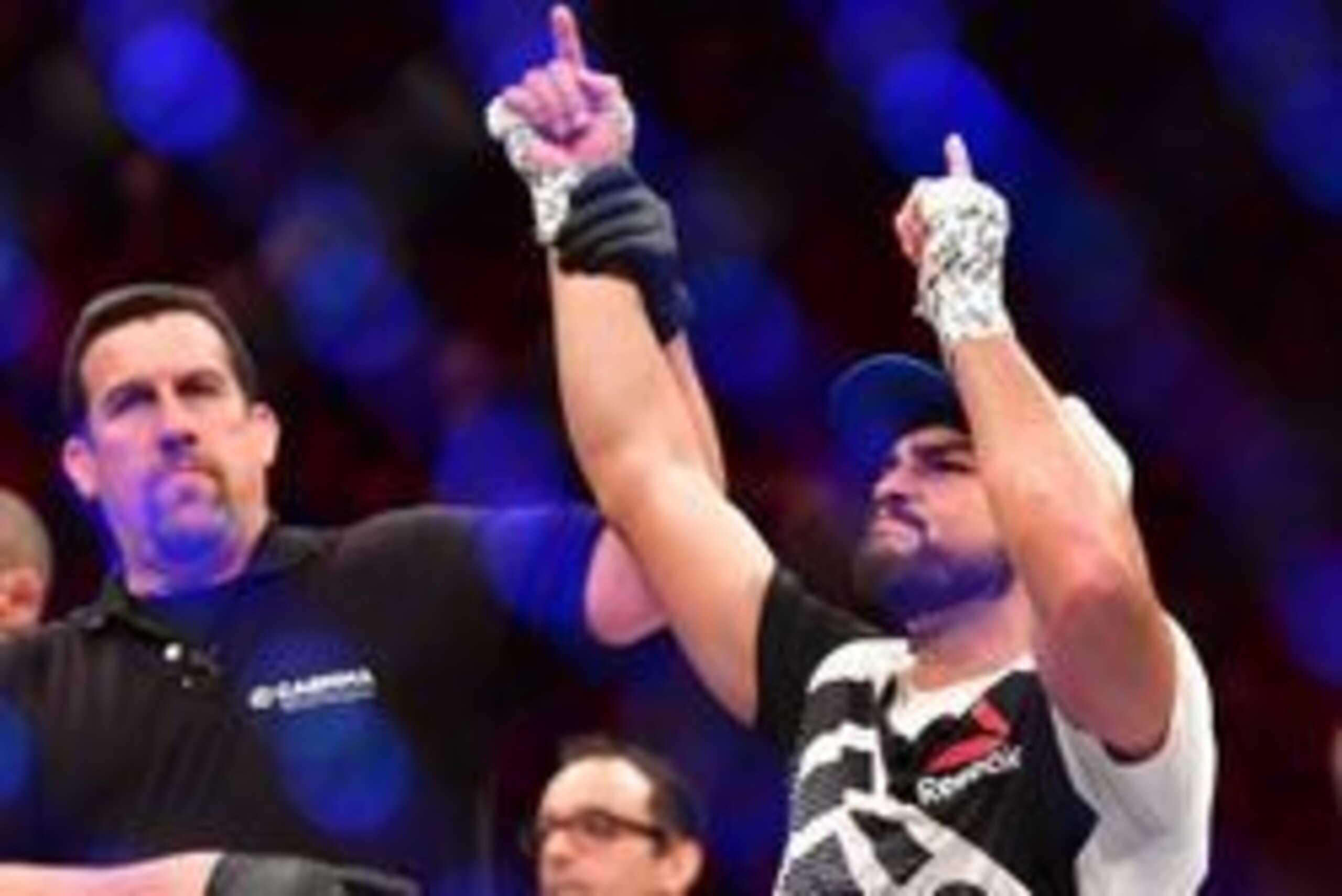Mar 11, 2017; Fortazela, Brazil, USA;  Kelvin Gastelum (blue gloves) defeats Vitor Belfort (red gloves) during UFC Fight Night at Centro de Formacao Olimpica de Fortaleza. Mandatory Credit: Jason Silva-USA TODAY Sports