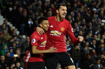 WEST BROMWICH, ENGLAND - DECEMBER 17:  Zlatan Ibrahimovic of Manchester United (R) celebrates scoring his sides first goal with Jesse Lingard of Manchester United (L) during the Premier League match between West Bromwich Albion and Manchester United at Th