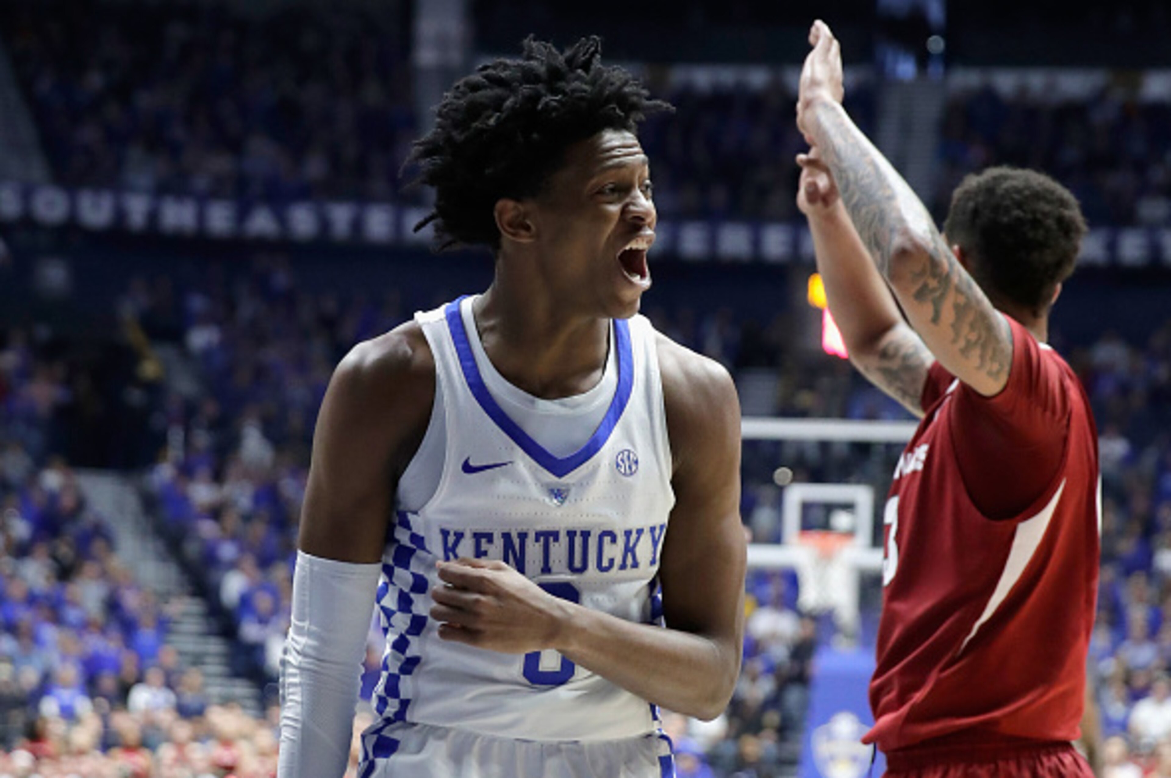 NASHVILLE, TN - MARCH 12:  De'Aaron Fox #0 of the Kentucky Wildcats celebrates against the Arkansas Razorbacks during the final of the SEC Basketball Tournament at Bridgestone Arena on March 12, 2017 in Nashville, Tennessee.  (Photo by Andy Lyons/Getty Im
