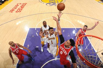 LOS ANGELES, CA - MARCH 12: D'Angelo Russell #1 of the Los Angeles Lakers shoots the ball against the Philadelphia 76ers on March 12, 2017 at STAPLES Center in Los Angeles, California. NOTE TO USER: User expressly acknowledges and agrees that, by download
