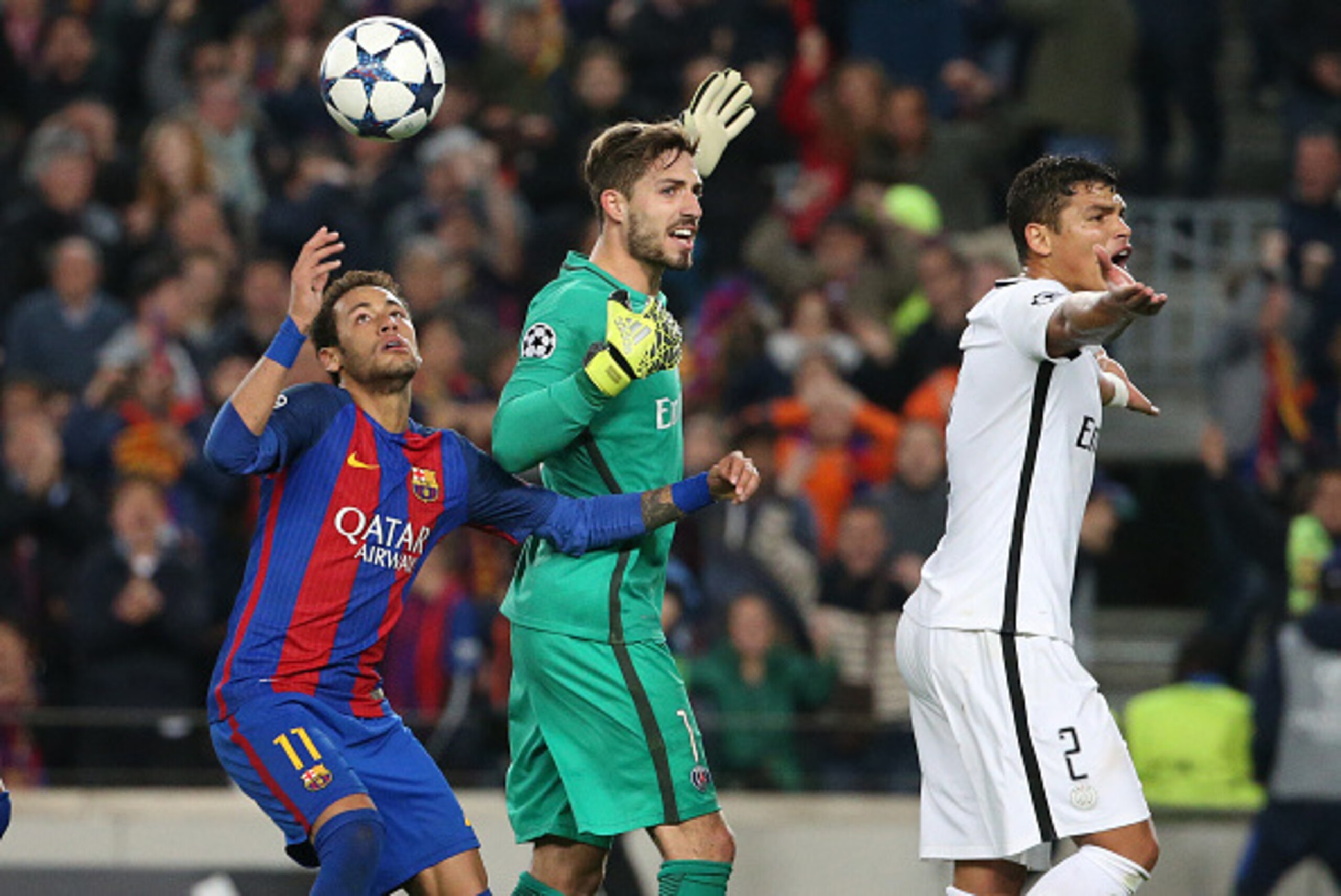 BARCELONA, SPAIN - MARCH 8: Goalkeeper of PSG Kevin Trapp and Thiago Silva of PSG protest against the second penalty while Neymar Jr of FC Barcelona catches the ball to kick the penalty during  the UEFA Champions League Round of 16 second leg match betwee