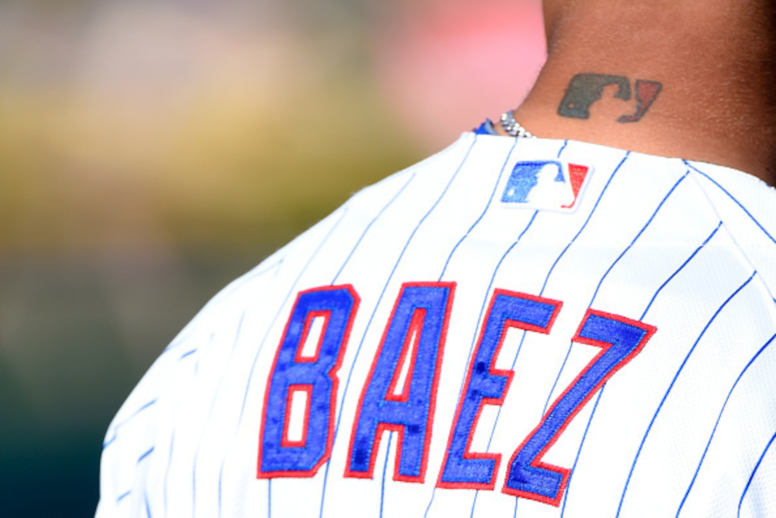 MESA, AZ - MARCH 26:  Javier Baez #9 of the Chicago Cubs warms up before the game against the Los Angeles Angels of Anaheim at Sloan Park on March 26, 2015 in Mesa, Arizona.  (Photo by Lisa Blumenfeld/Getty Images)