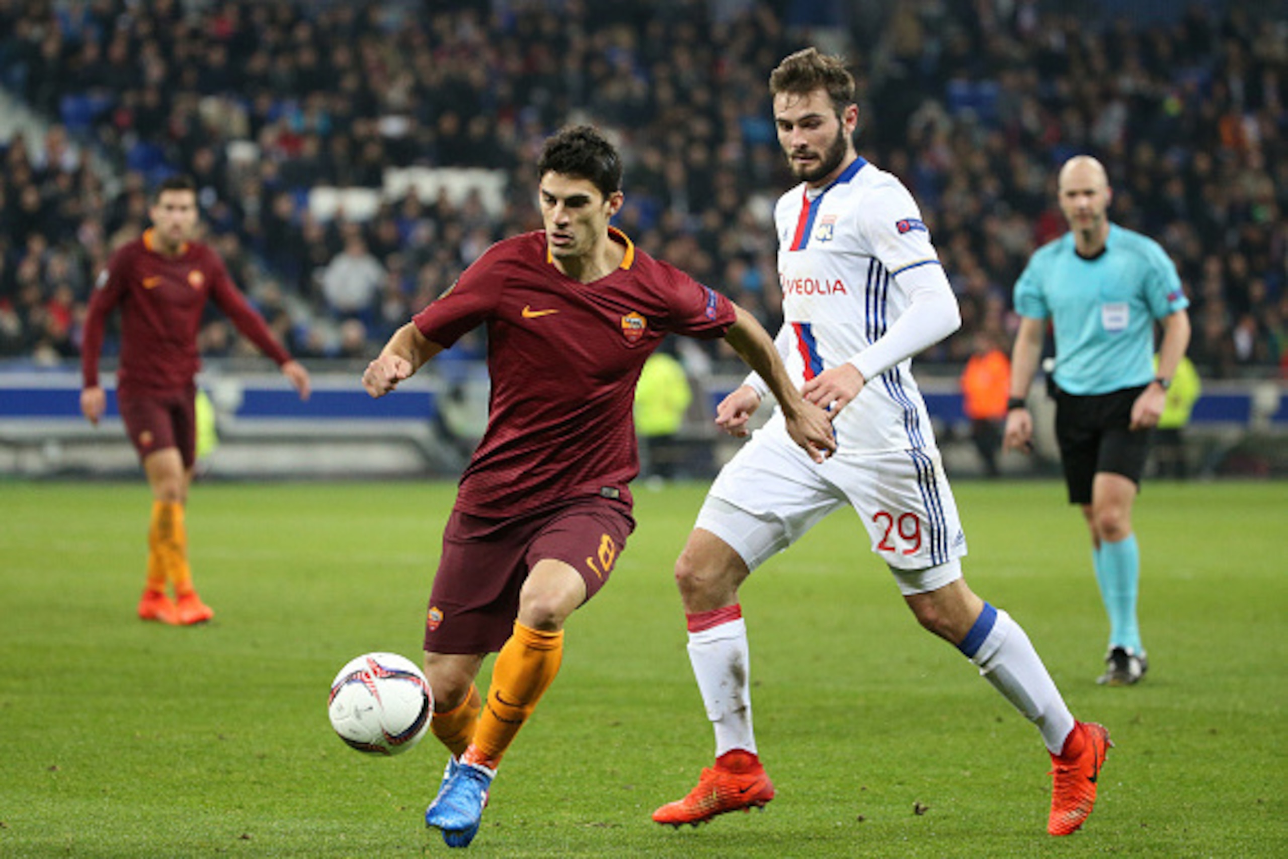 LYON, FRANCE - MARCH 9: Diego Perotti of AS Roma and Lucas Tousart of Lyon in action during the UEFA Europa League Round of 16 first leg match between Olympique Lyonnais (OL) and AS Roma at Parc OL on March 9, 2017 in Lyon, France. (Photo by Jean Catuffe/