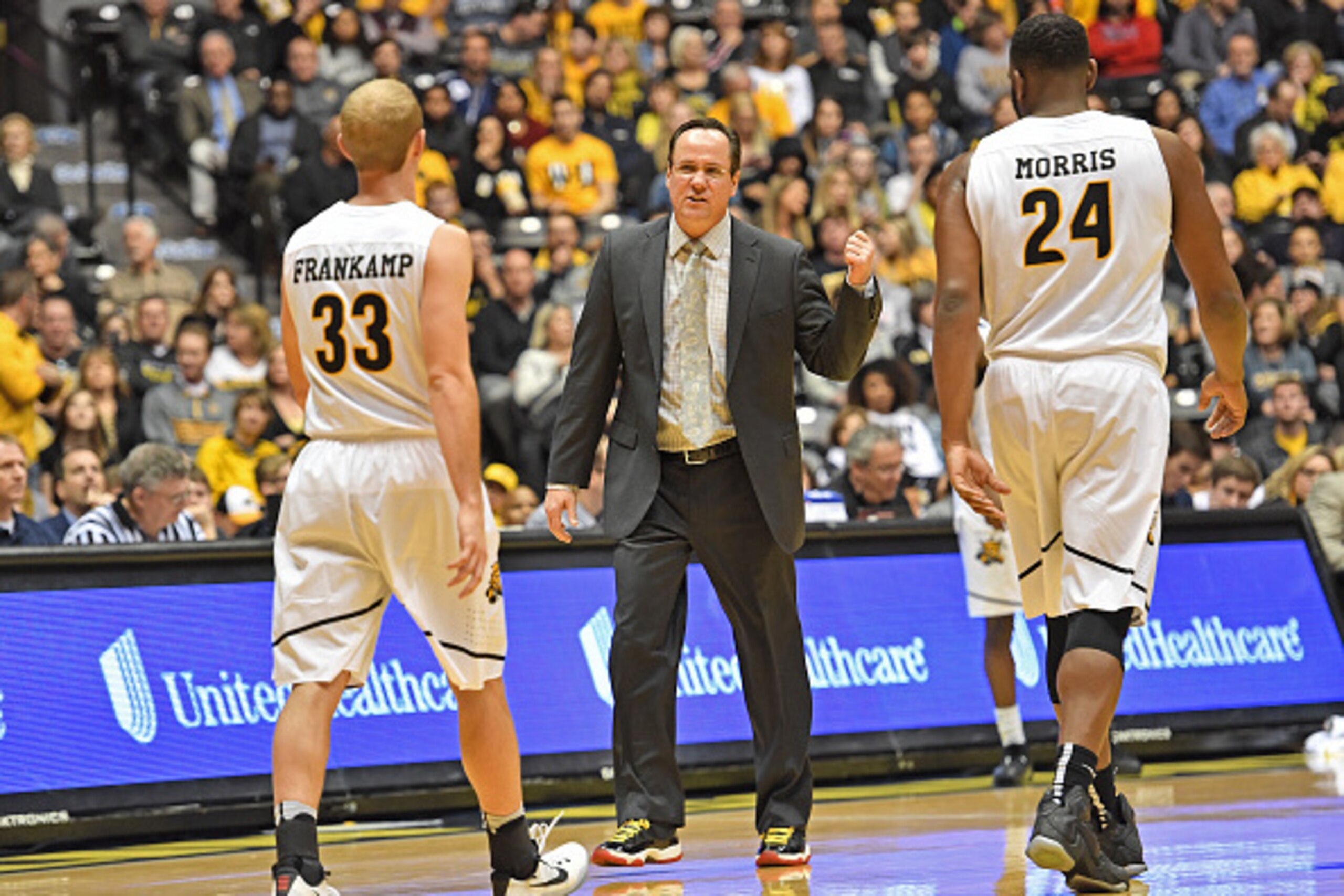 WICHITA, KS - JANUARY 24:  Head coach Gregg Marshall (C) of the Wichita State Shockers instructs players Conner Frankamp #33 and Shaquille Morris #24 during the first half against the Southern Illinois Salukis on January 24, 2017 at Charles Koch Arena in 