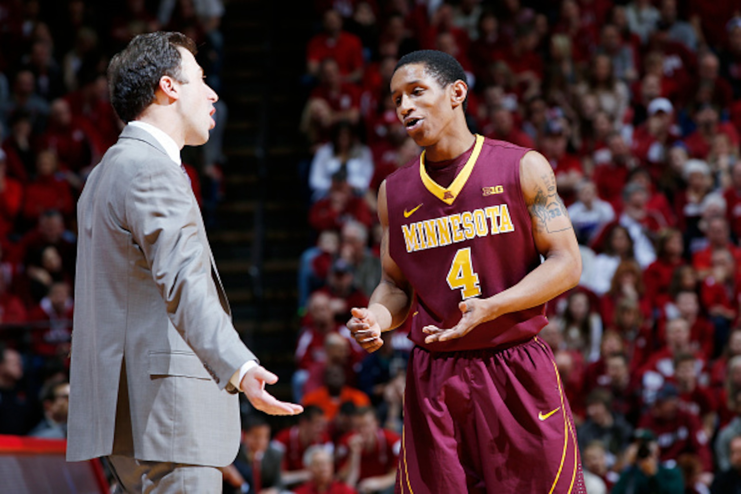 BLOOMINGTON, IN - FEBRUARY 15: DeAndre Mathieu #4 of the Minnesota Golden Gophers talks to head coach Richard Pitino during the game against the Indiana Hoosiers at Assembly Hall on February 15, 2015 in Bloomington, Indiana. Indiana defeated Minnesota 90-