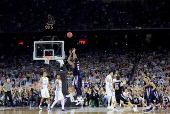 HOUSTON, TEXAS - APRIL 04:  Kris Jenkins #2 of the Villanova Wildcats shoots the game-winning three pointer to defeat the North Carolina Tar Heels 77-74 in the 2016 NCAA Men's Final Four National Championship game at NRG Stadium on April 4, 2016 in Housto