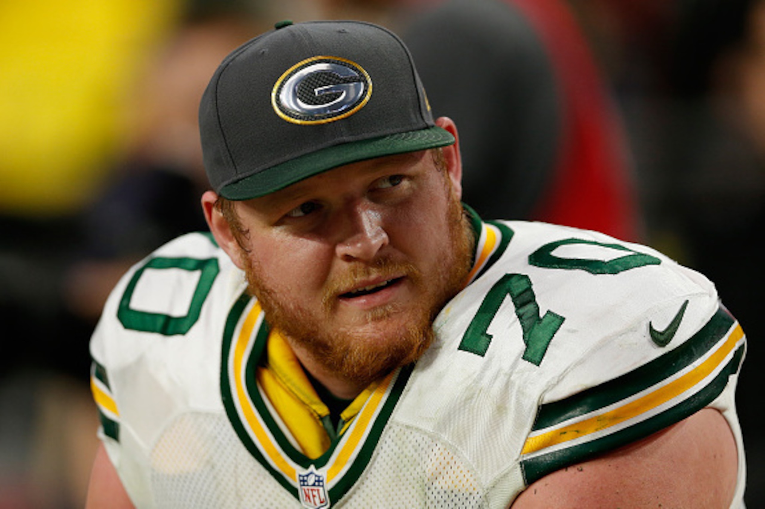 GLENDALE, AZ - DECEMBER 27:  Guard T.J. Lang #70 of the Green Bay Packers on the sidelines during the NFL game against the Arizona Cardinals at the University of Phoenix Stadium on December 27, 2015 in Glendale, Arizona. The Cardinals defeated the Packers