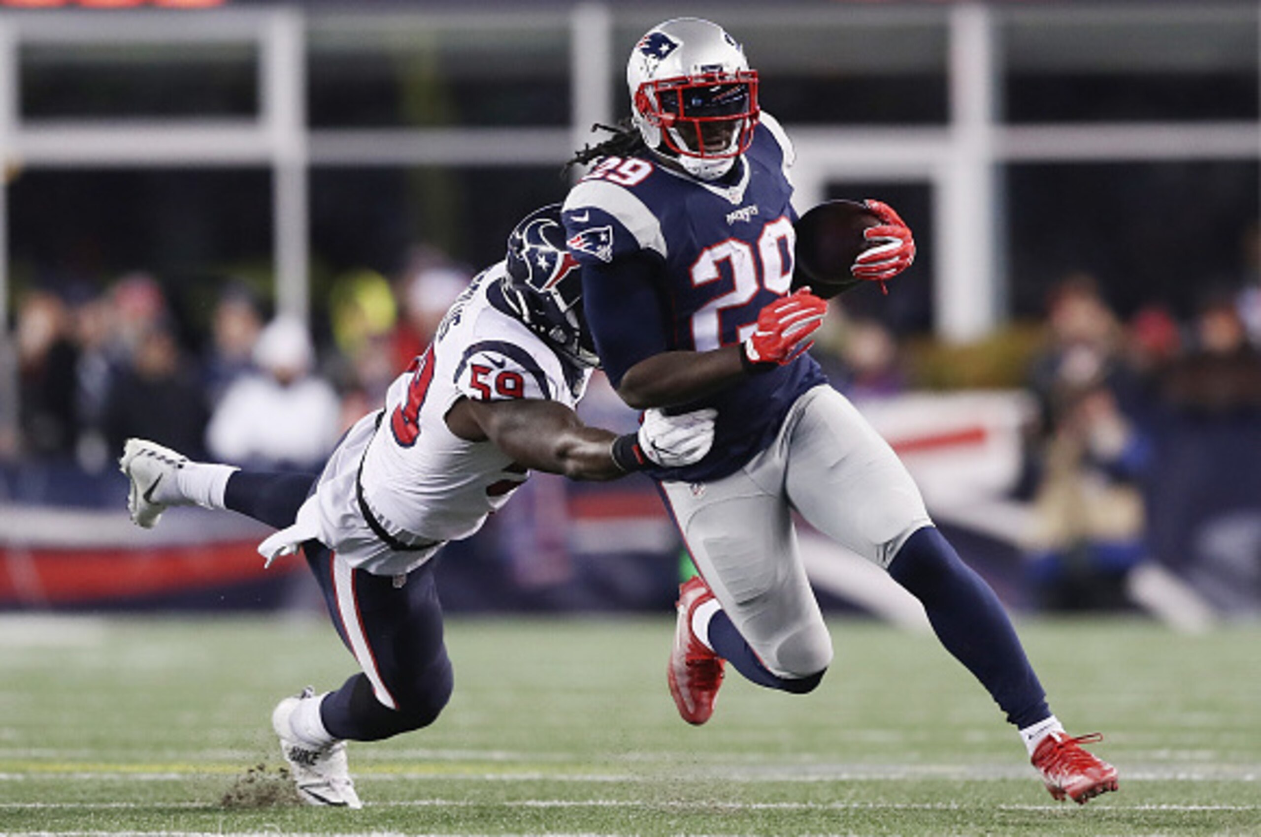 FOXBORO, MA - JANUARY 14:  LeGarrette Blount #29 of the New England Patriots runs the ball in the second half against the Houston Texans during the AFC Divisional Playoff Game at Gillette Stadium on January 14, 2017 in Foxboro, Massachusetts.  (Photo by E