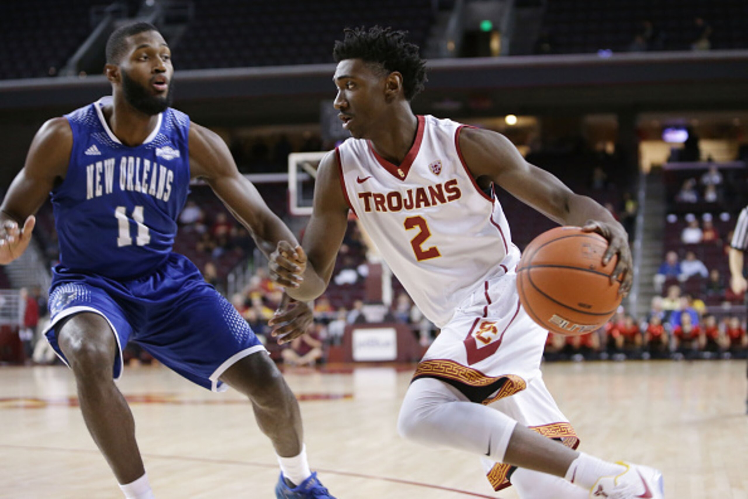 LOS ANGELES, CA - NOVEMBER 22: Jonah Mathews #2 of the USC Trojans handles the ball against Michael Zeno #11 of the New Orleans Privateers in USC's fourth straingt win 88-52 during a NCAA college basketball game at Galen Center on November 22, 2016 in Los