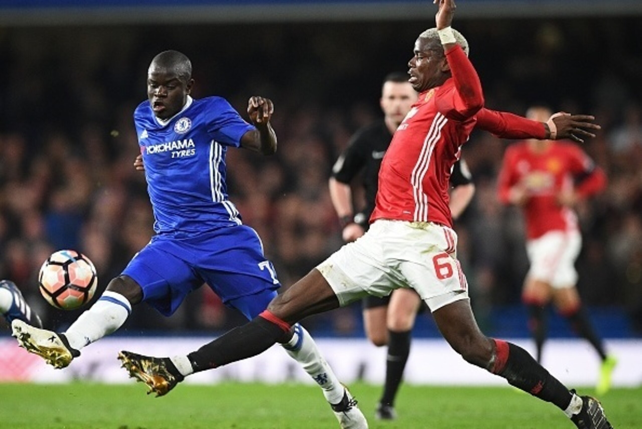 Chelsea's French midfielder N'Golo Kante (L) vies with Manchester United's French midfielder Paul Pogba during the English FA Cup quarter final football match between Chelsea and Manchester United at Stamford Bridge in London on March 13, 2017. / AFP PHOT Chelsea's French midfielder N'Golo Kante (L) vies with Manchester United's French midfielder Paul Pogba during the English FA Cup quarter final football match between Chelsea and Manchester United at Stamford Bridge in London on March 13, 2017. / AFP PHOT