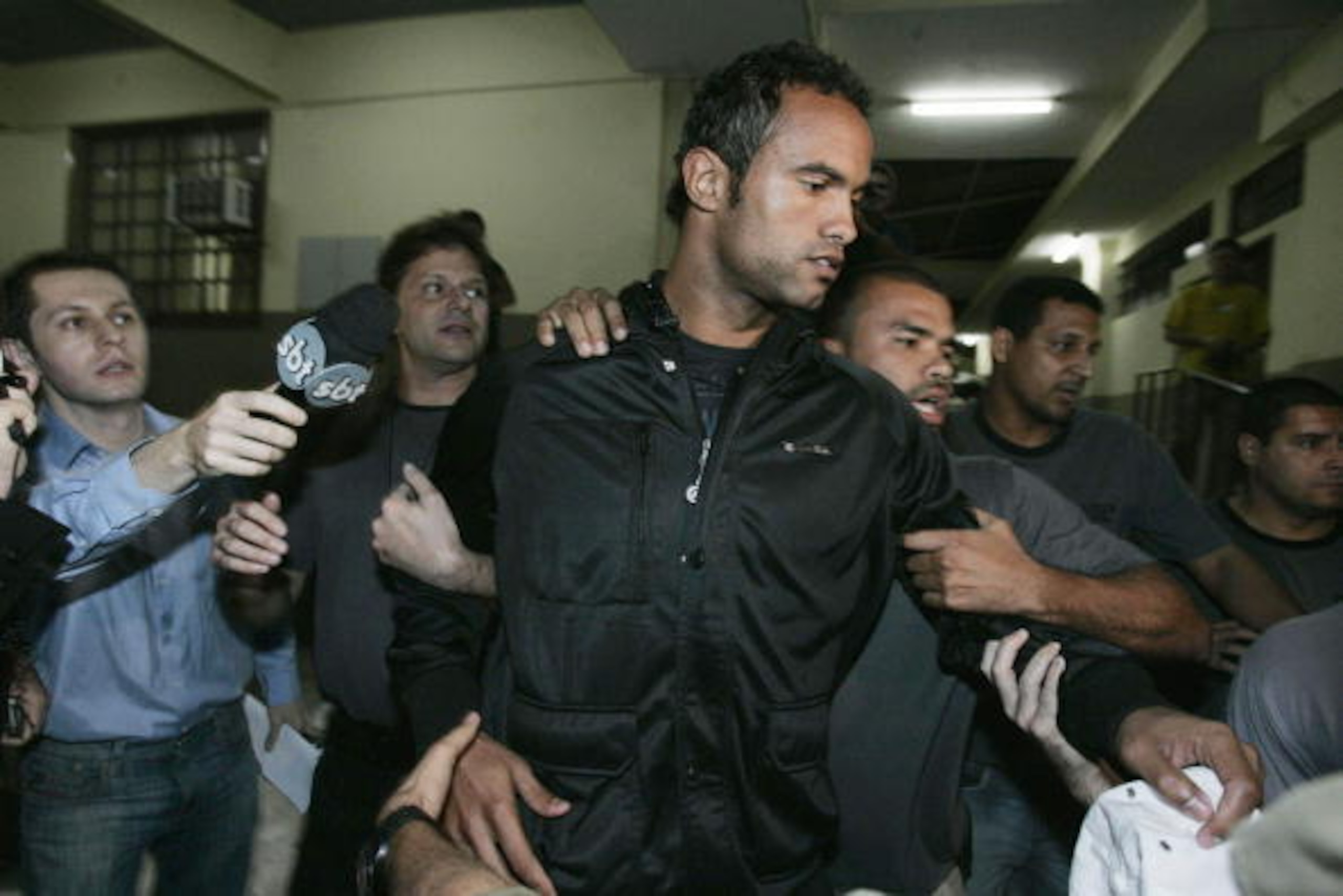 Brazilian footballer Bruno Fernandes de Souza, is taken into custody July 7, 2010 in Rio de Janeiro, Brazil. Fernandes de Sousa, a star goalkeeper for the popular Brazilian club Flamengo, surrendered to police Wednesday to face questioning in connection w