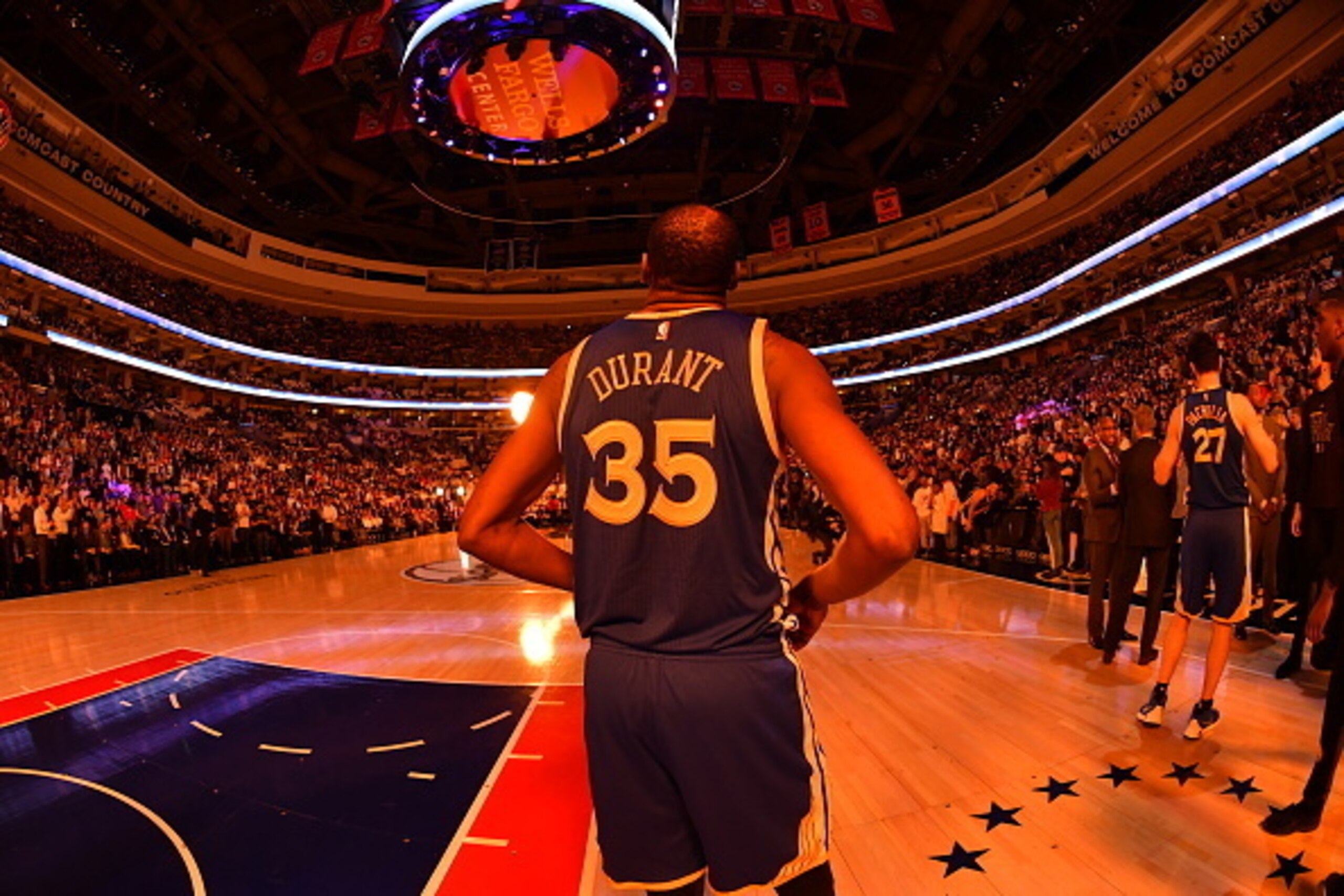 PHILADELPHIA,PA - FEBRUARY 27 : Kevin Durant #35 of the Golden State Warriors looks on prior to the game against the Philadelphia 76ers at Wells Fargo Center on February 27, 2017 in Philadelphia, Pennsylvania NOTE TO USER: User expressly acknowledges and 