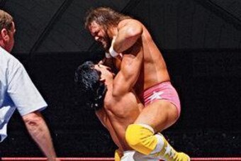 Ricky Steamboat lifts Randy Savage off the ground.