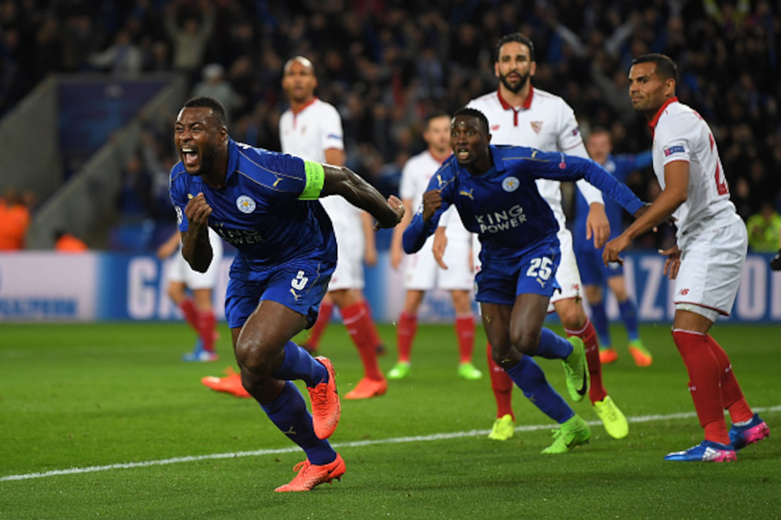 LEICESTER, ENGLAND - MARCH 14:  Wes Morgan of Leicester City celebrates after scoring the opening goal during the UEFA Champions League Round of 16, second leg match between Leicester City and Sevilla FC at The King Power Stadium on March 14, 2017 in Leic
