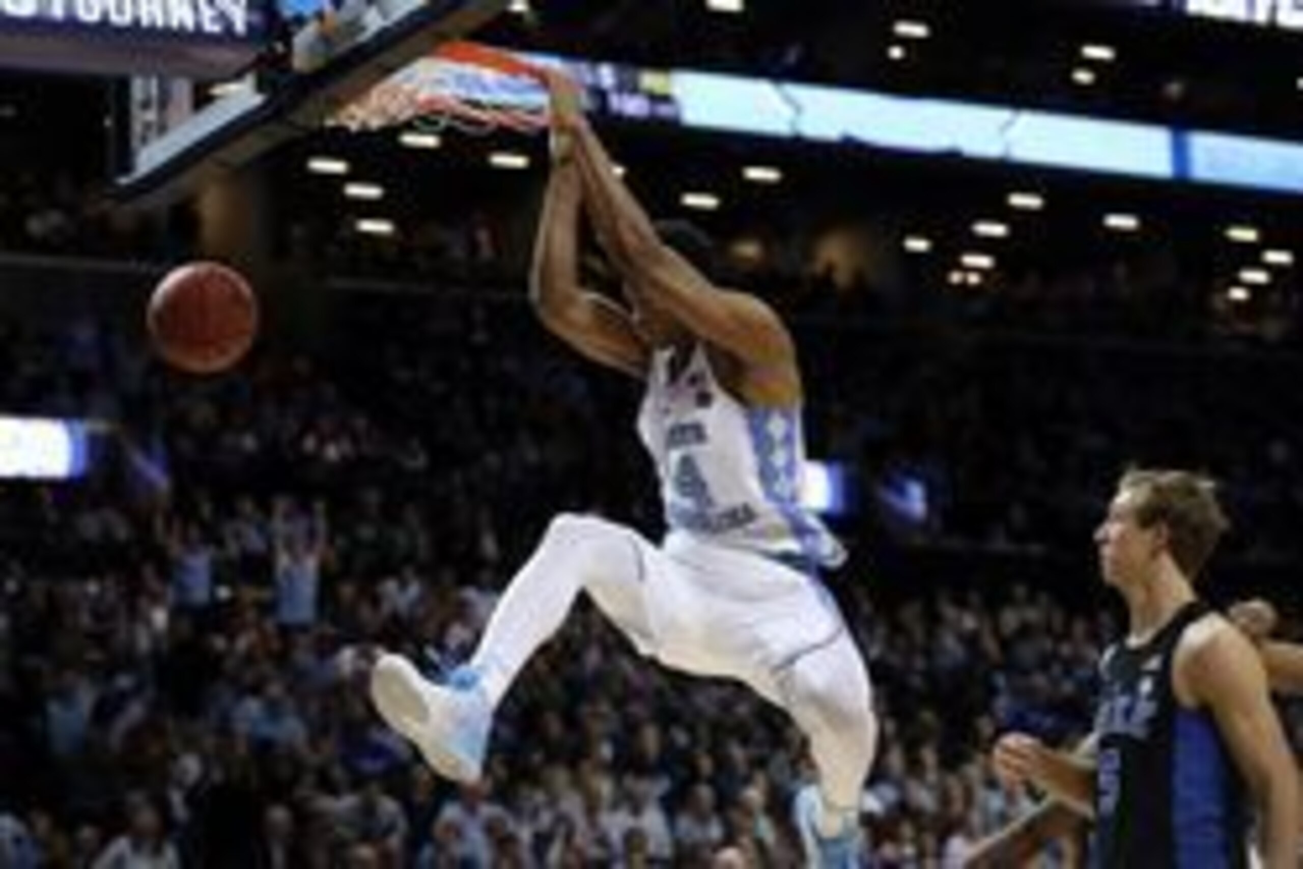 Mar 10, 2017; Brooklyn, NY, USA; North Carolina Tar Heels forward Isaiah Hicks (4) dunks during the second half against the Duke Blue Devils during the ACC Conference Tournament at Barclays Center. Duke Blue Devils won 93-83. Mandatory Credit: Anthony Gru