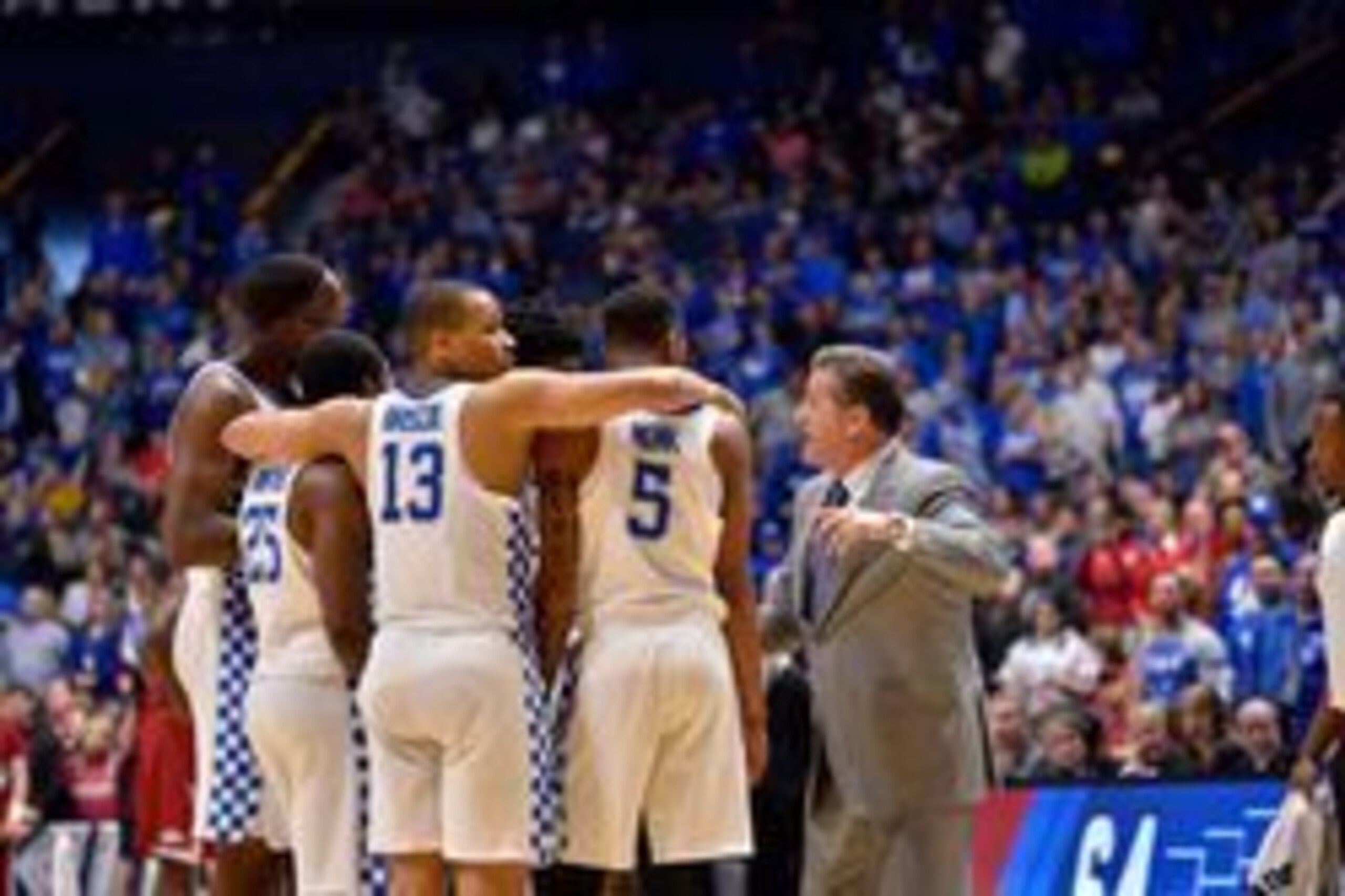 Mar 12, 2017; Nashville, TN, USA; Kentucky Wildcats head coach John Calipari talks with his team during a second half time out of the championship game of the SEC Conference Tournament against the Arkansas Razorbacks at Bridgestone Arena. Kentucky won 82-